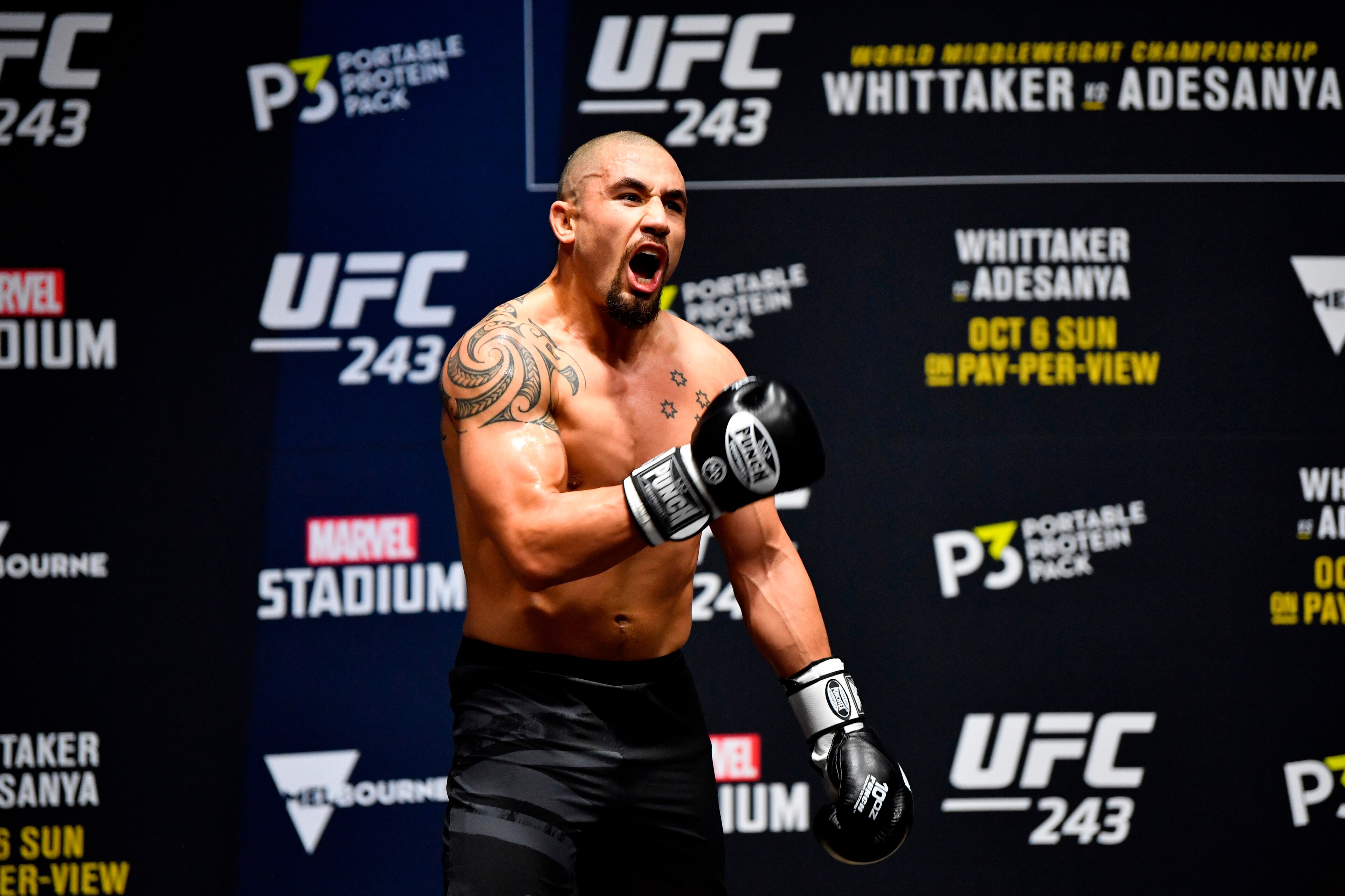 MELBOURNE, AUSTRALIA - OCTOBER 03: Robert Whittaker of New Zealand holds an open training session for fans and media during UFC 243 open workouts at Federation Square on October 3, 2019 in Melbourne, Australia. (Photo by Jeff Bottari/Zuffa LLC/Zuffa LLC MELBOURNE, AUSTRALIA - OCTOBER 03: Robert Whittaker of New Zealand holds an open training session for fans and media during UFC 243 open workouts at Federation Square on October 3, 2019 in Melbourne, Australia. (Photo by Jeff Bottari/Zuffa LLC/Zuffa LLC