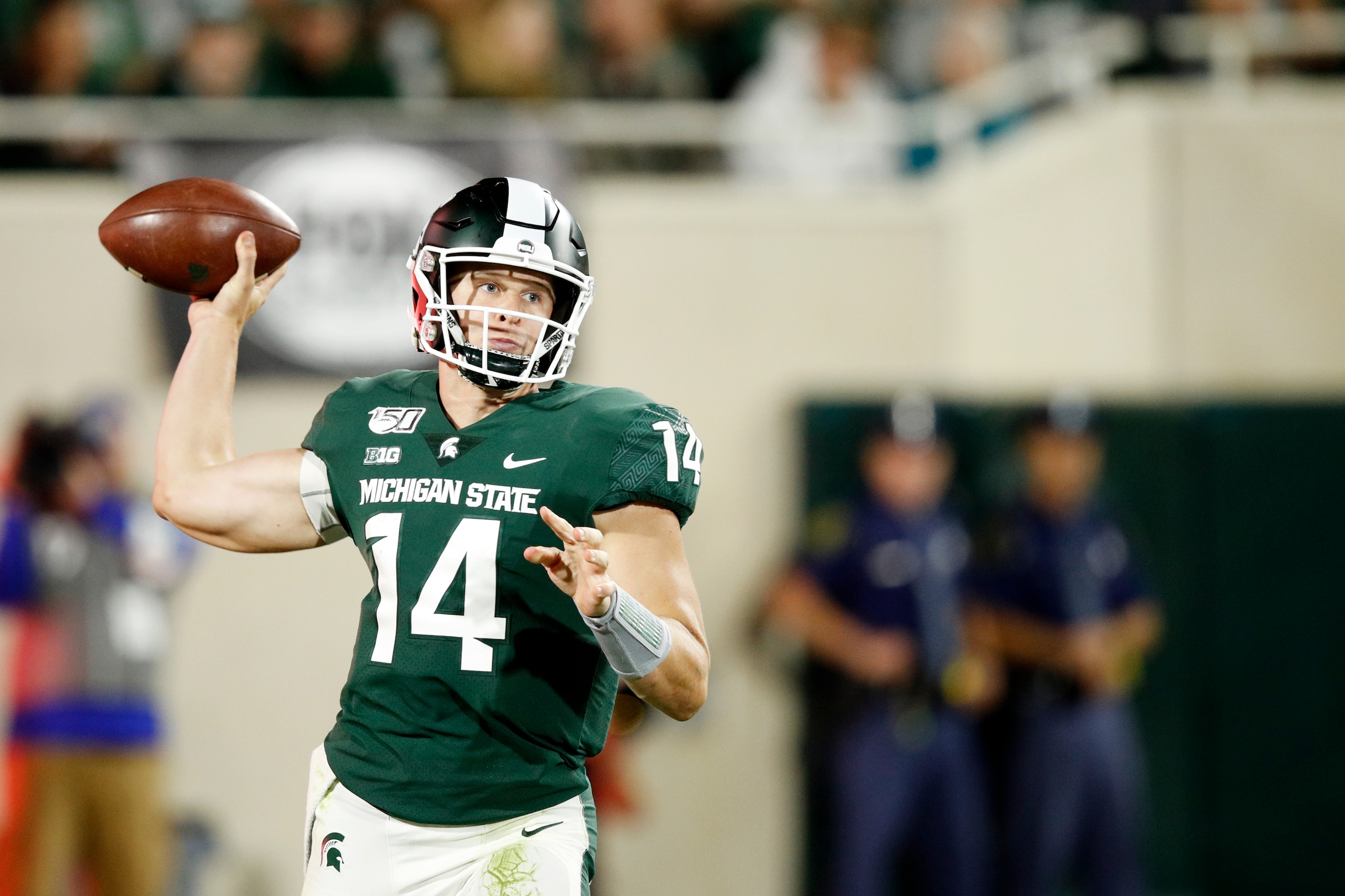 EAST LANSING, MI - AUGUST 30: Brian Lewerke #14 of the Michigan State Spartans throws a pass during a game against the Tulsa Golden Hurricane at Spartan Stadium on August 30, 2019 in East Lansing, Michigan. Michigan State defeated Tulsa 28-7. (Photo by Jo