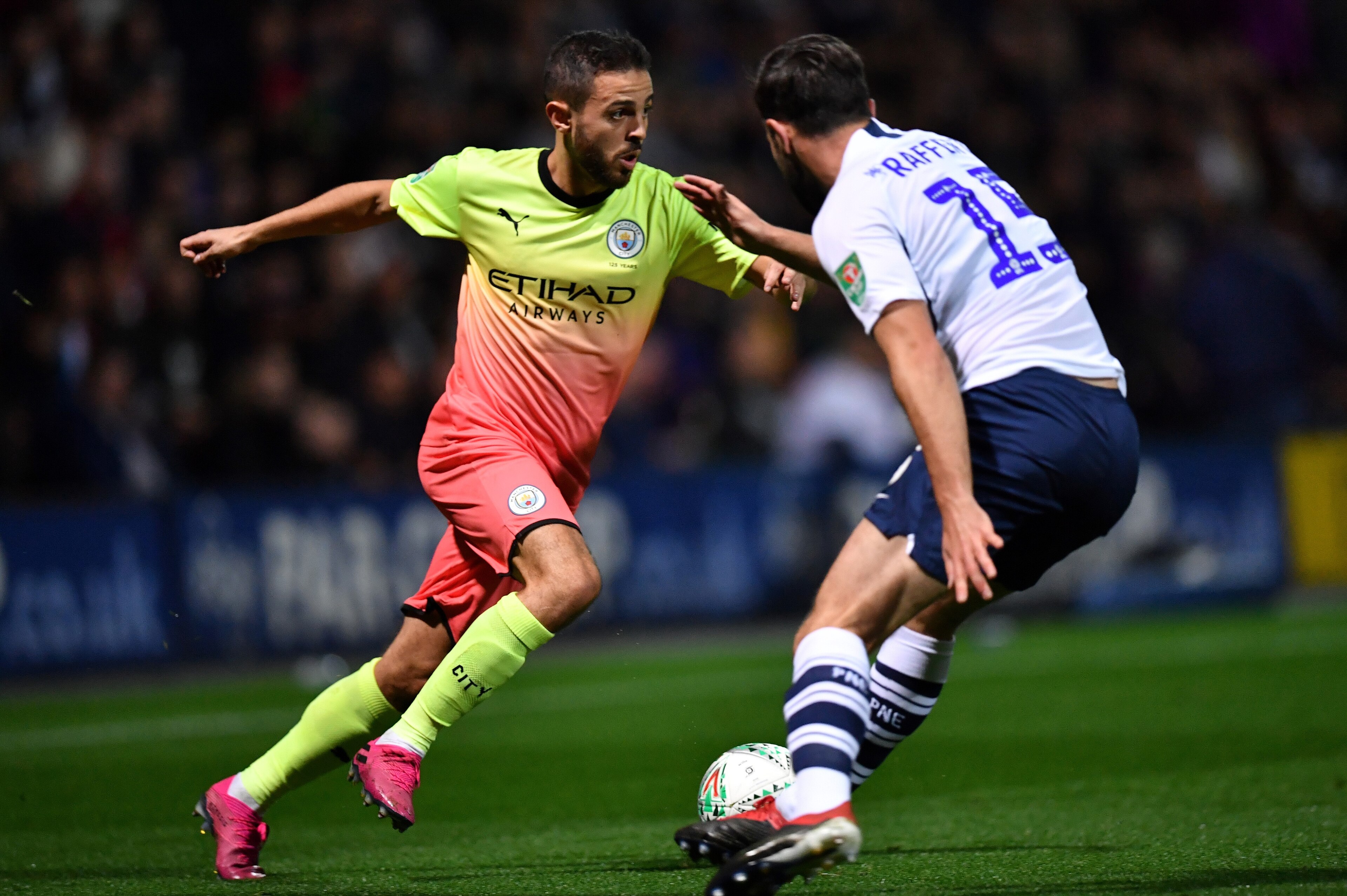 Manchester City's Portuguese midfielder Bernardo Silva (L) vies with Preston's Irish defender Joe Rafferty during the English League Cup third round football match between Preston North End and Manchester City at the Deepdale stadium in northwest England, Manchester City's Portuguese midfielder Bernardo Silva (L) vies with Preston's Irish defender Joe Rafferty during the English League Cup third round football match between Preston North End and Manchester City at the Deepdale stadium in northwest England,