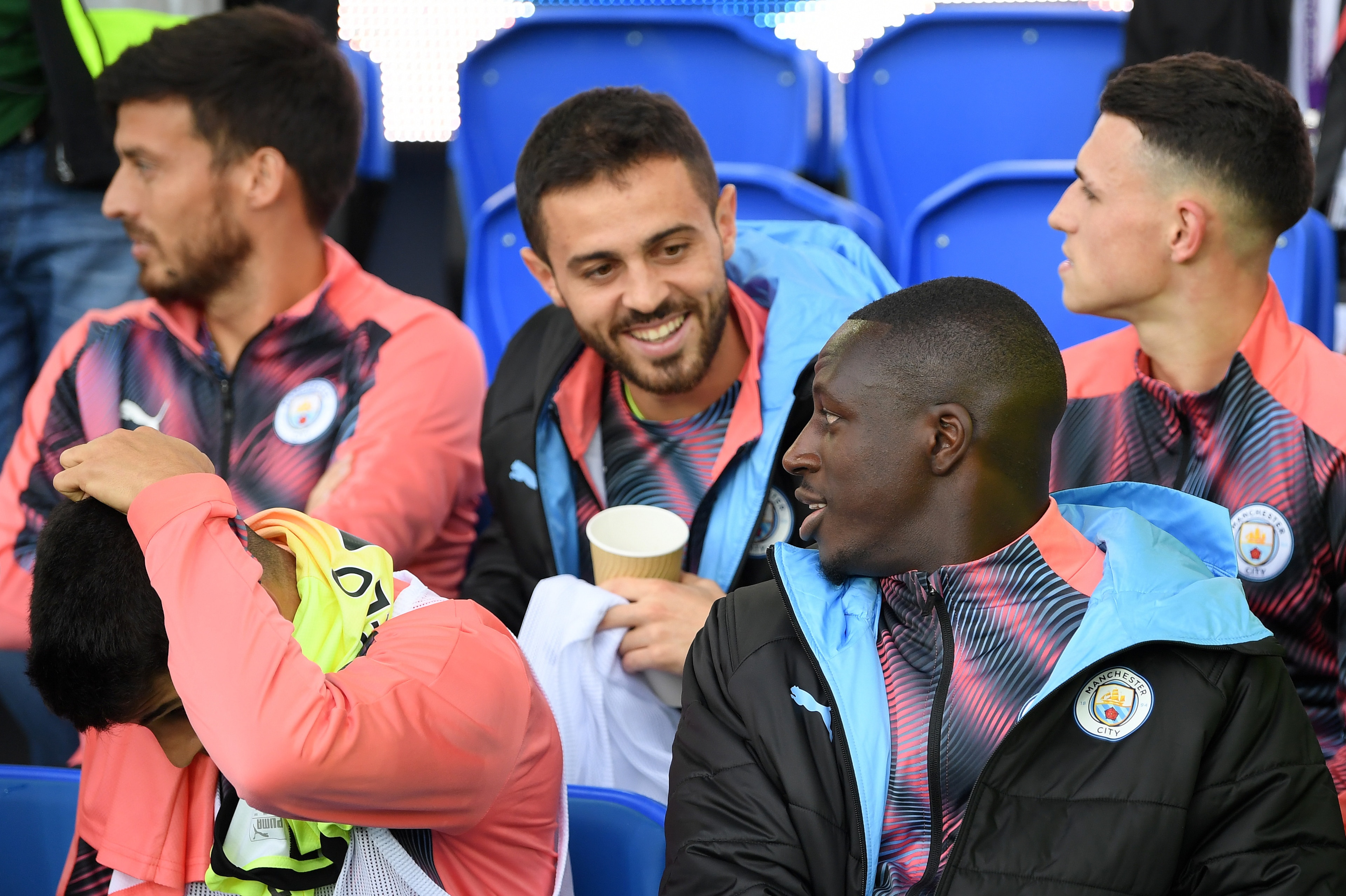 LIVERPOOL, ENGLAND - SEPTEMBER 28: Bernardo Silva of Manchester City speaks to Benjamin Mendy of Manchester City on the bench during the Premier League match between Everton FC and Manchester City at Goodison Park on September 28, 2019 in Liverpool, Unite LIVERPOOL, ENGLAND - SEPTEMBER 28: Bernardo Silva of Manchester City speaks to Benjamin Mendy of Manchester City on the bench during the Premier League match between Everton FC and Manchester City at Goodison Park on September 28, 2019 in Liverpool, Unite
