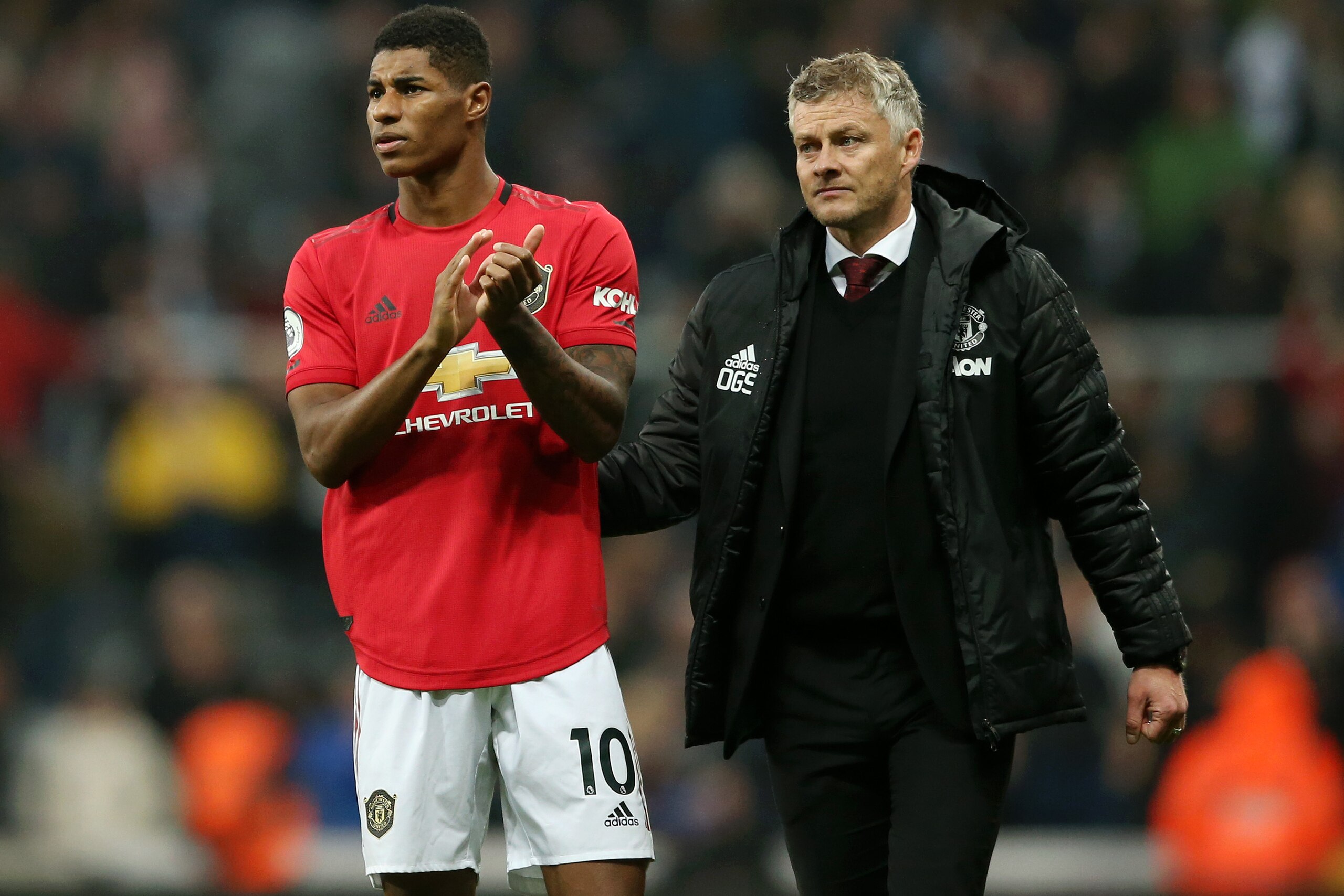NEWCASTLE UPON TYNE, ENGLAND - OCTOBER 06: Marcus Rashford of Manchester United  applauds fans after his sides defeat in the Premier League match between Newcastle United and Manchester United at St. James Park on October 06, 2019 in Newcastle upon Tyne, 
