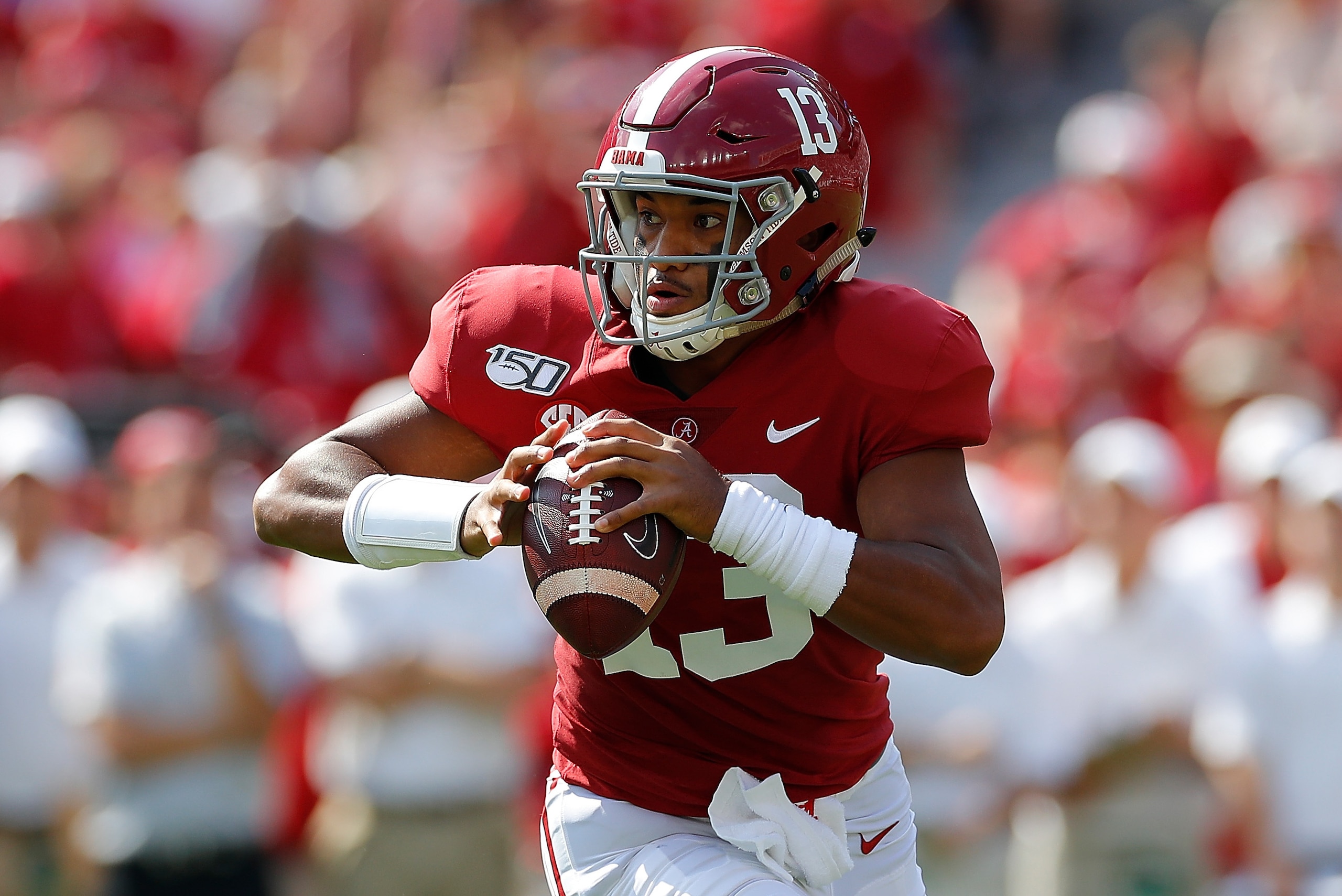 TUSCALOOSA, ALABAMA - SEPTEMBER 28:  Tua Tagovailoa #13 of the Alabama Crimson Tide looks to pass against the Mississippi Rebels at Bryant-Denny Stadium on September 28, 2019 in Tuscaloosa, Alabama. (Photo by Kevin C. Cox/Getty Images)