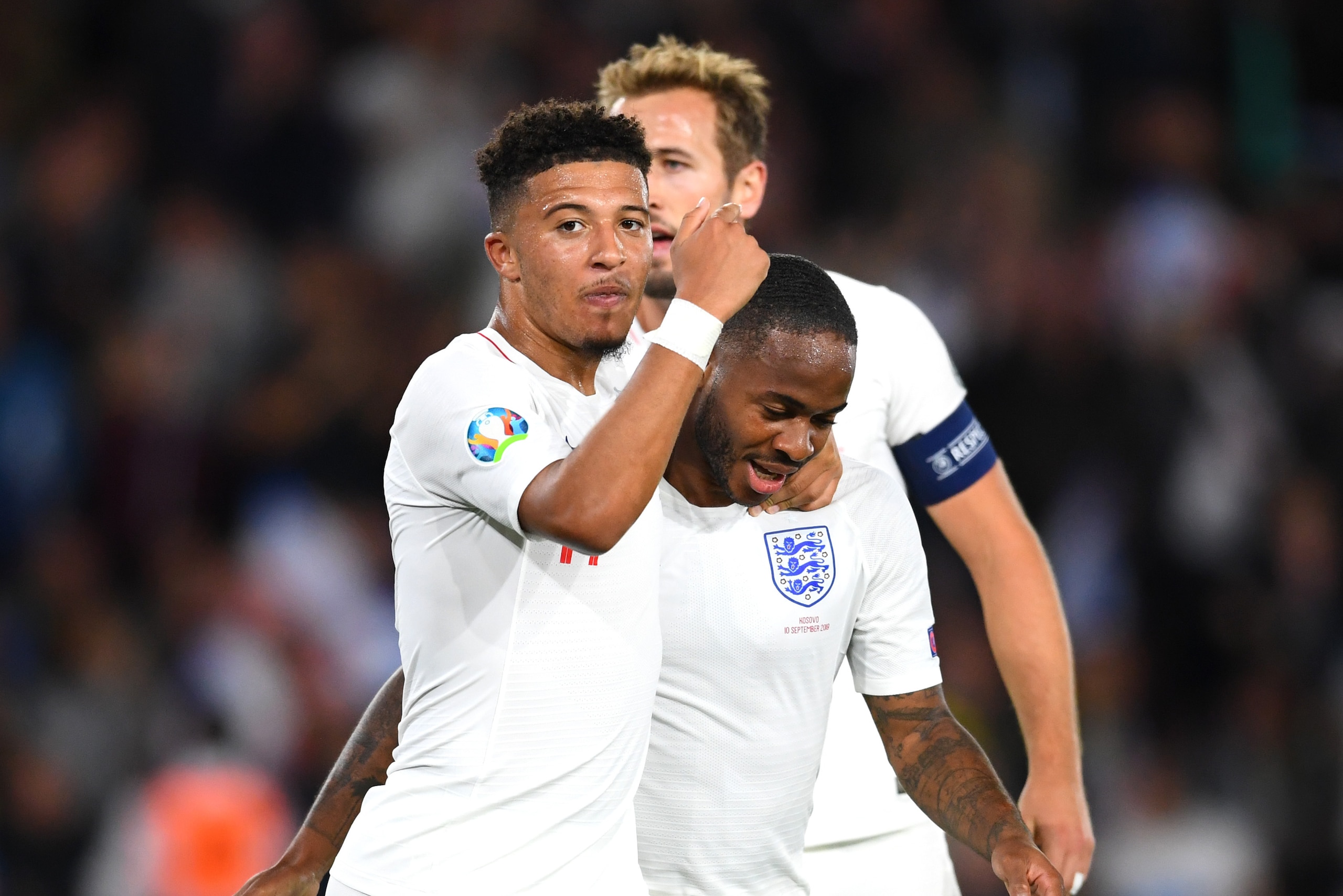 SOUTHAMPTON, ENGLAND - SEPTEMBER 10: Jadon Sancho of England celebrates with team mates Raheem Sterling after scoring his sides fifth goal during the UEFA Euro 2020 qualifier match between England and Kosovo at St. Mary's Stadium on September 10, 2019 in 