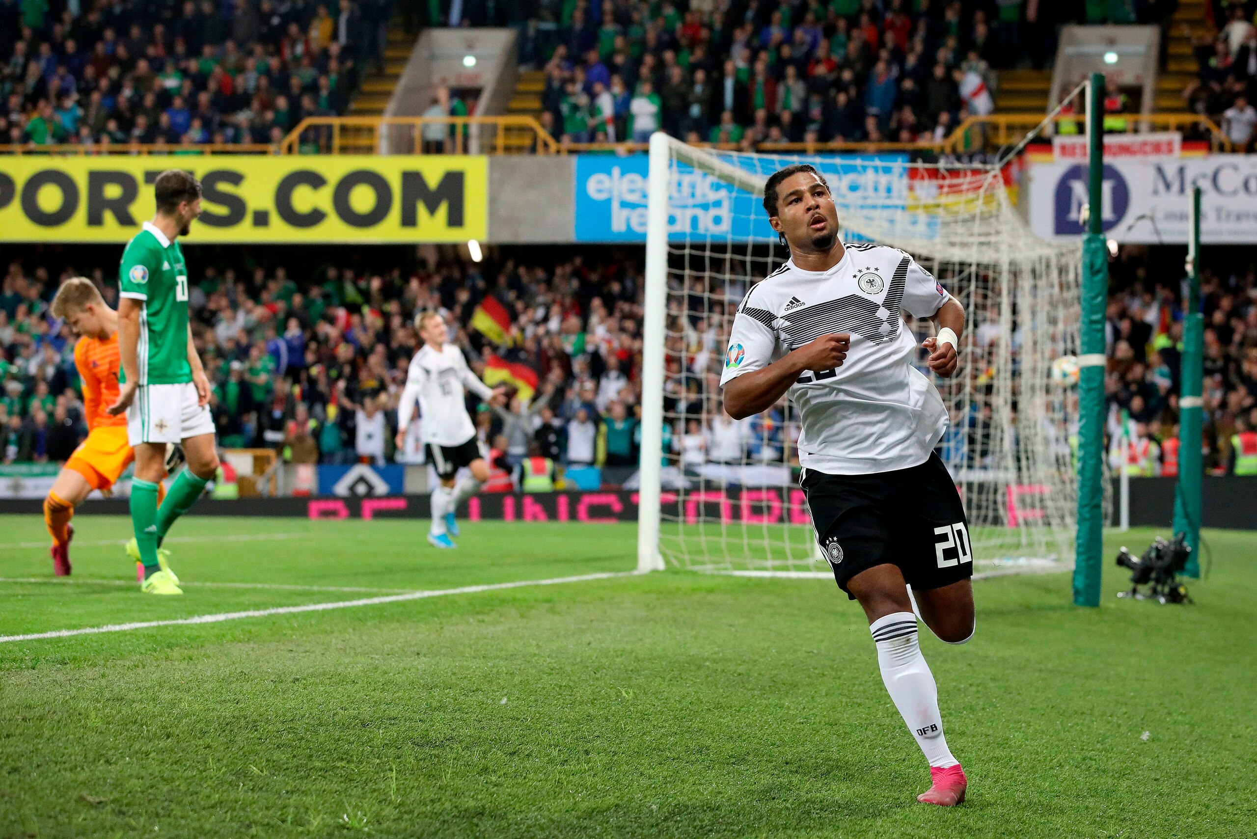Germany's midfielder Serge Gnabry celebrates scoring their second goal during the the Euro 2020 football qualification match between Northern Ireland and Germany at Windsor Park in Belfast on September 9, 2019. (Photo by PAUL FAITH / AFP)        (Photo cr