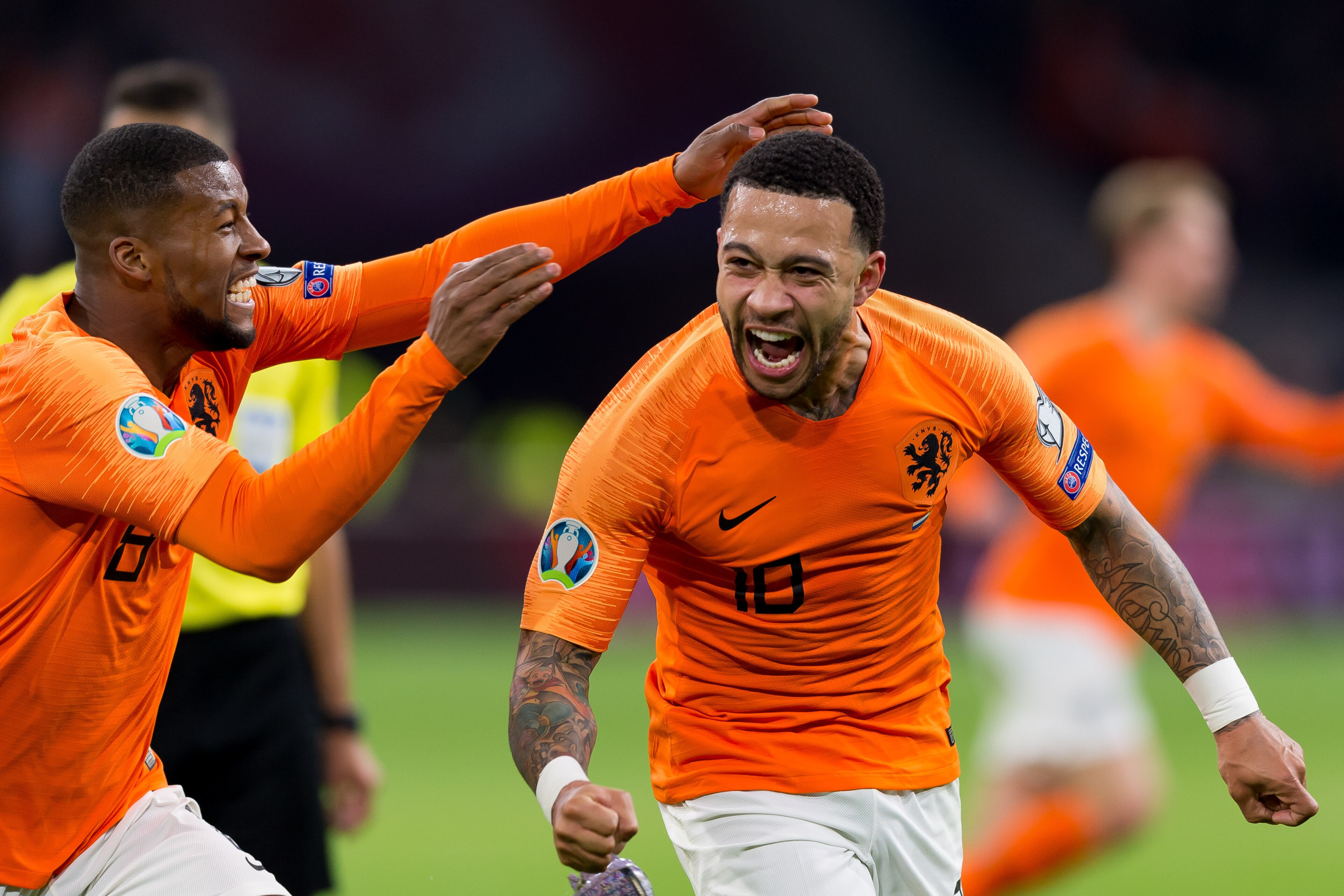 AMSTERDAM, NETERLANDS - MARCH 24: Memphis Depay of Netherlands celebrates after scoring his team's second goal during the 2020 UEFA European Championships group C qualifying match between Netherlands and Germany at Johan Cruijff ArenA on March 24, 2019 in
