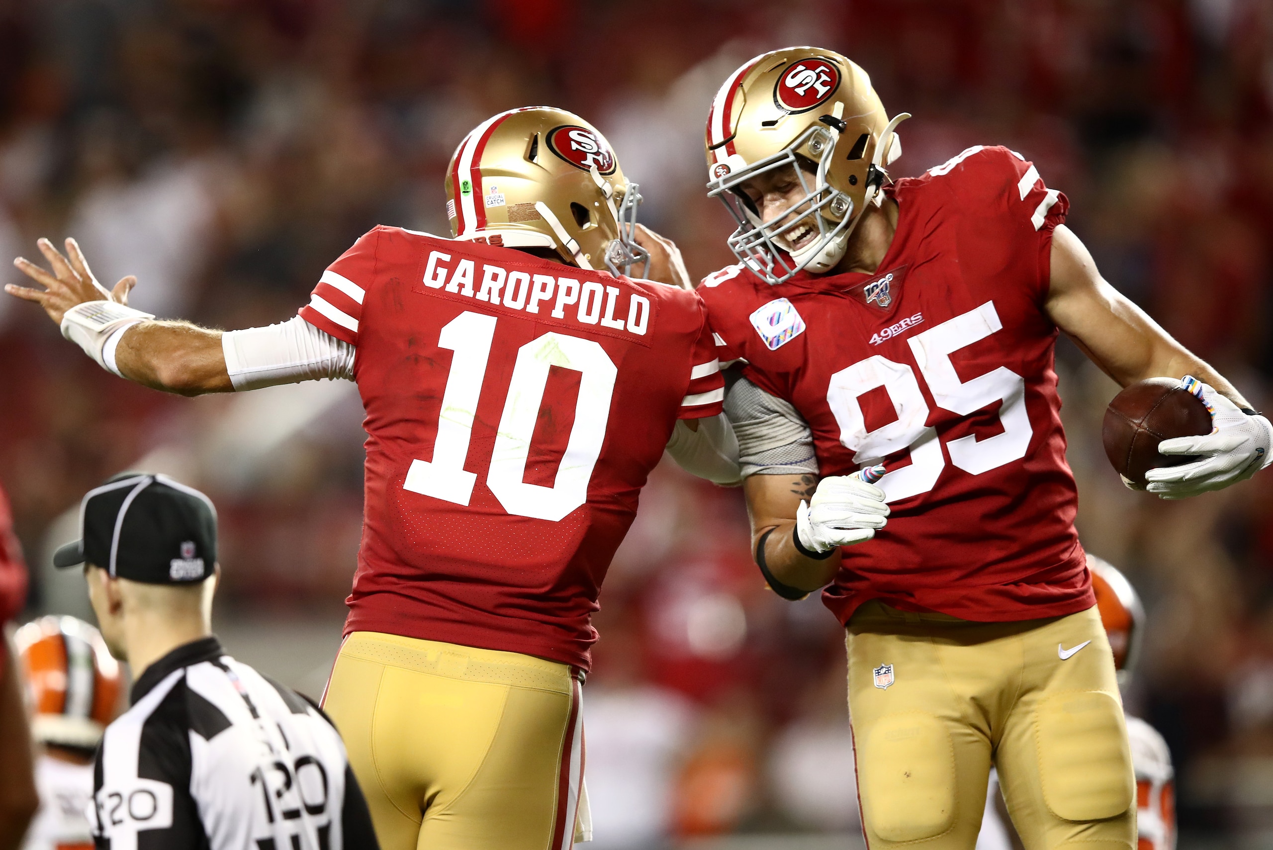 SANTA CLARA, CALIFORNIA - OCTOBER 07:  George Kittle #85 is congratulated by Jimmy Garoppolo #10 of the San Francisco 49ers after Garoppolo threw a touchdown pass to Kittle against the Cleveland Browns at Levi's Stadium on October 07, 2019 in Santa Clara,