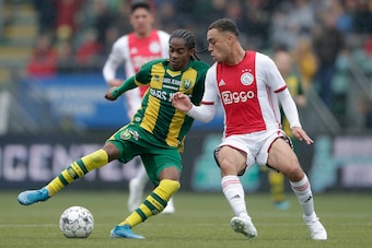 DEN HAAG, NETHERLANDS - OCTOBER 6: (L-R) Crysencio Summerville of ADO Den Haag, Sergino Dest of Ajax  during the Dutch Eredivisie  match between ADO Den Haag v Ajax at the Cars Jeans Stadium on October 6, 2019 in Den Haag Netherlands (Photo by Laurens Lin