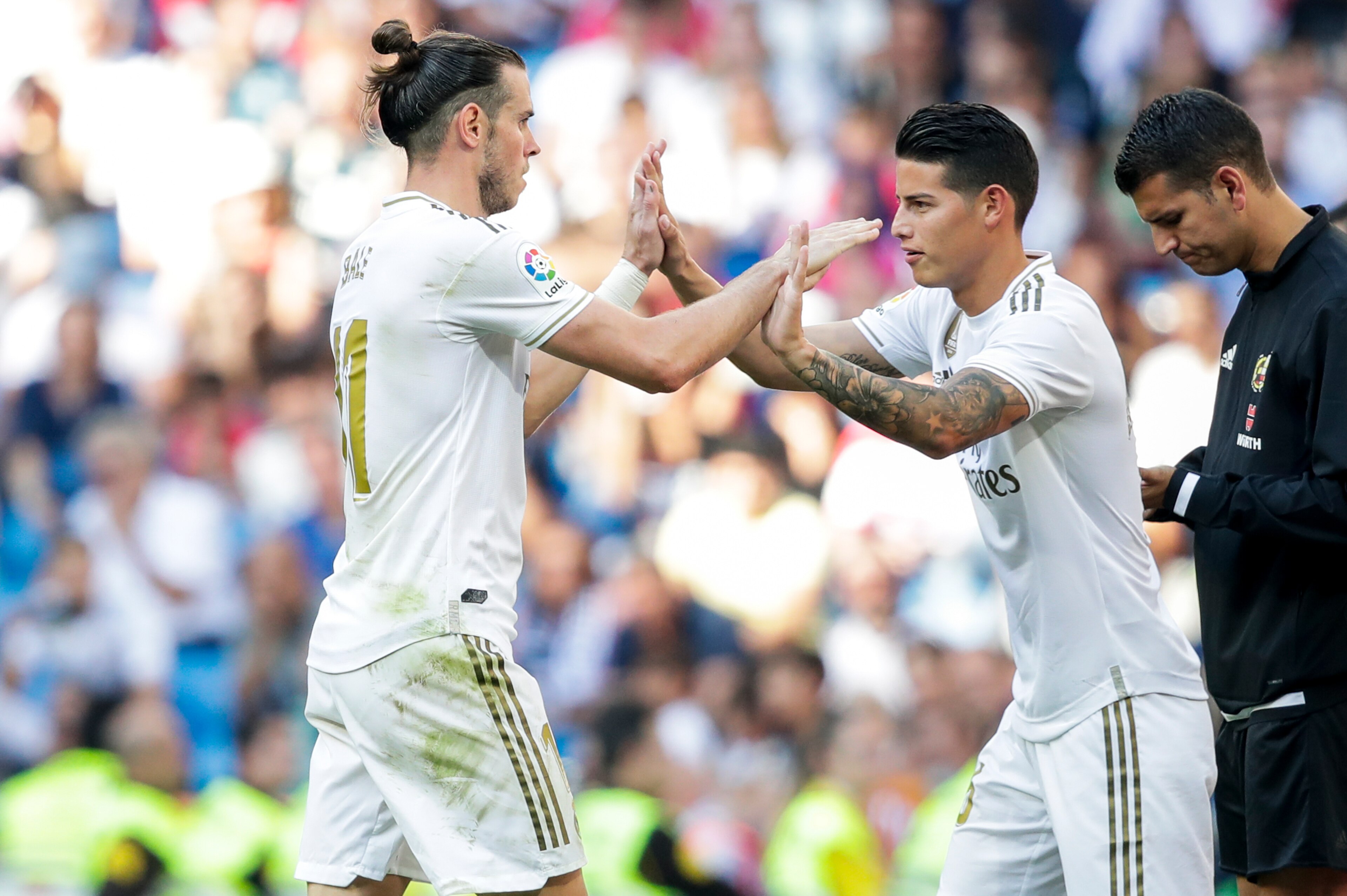 MADRID, SPAIN - OCTOBER 5: (L-R) Gareth Bale of Real Madrid, James Rodriguez of Real Madrid during the La Liga Santander  match between Real Madrid v Granada at the Santiago Bernabeu on October 5, 2019 in Madrid Spain (Photo by David S. Bustamante/Soccrat
