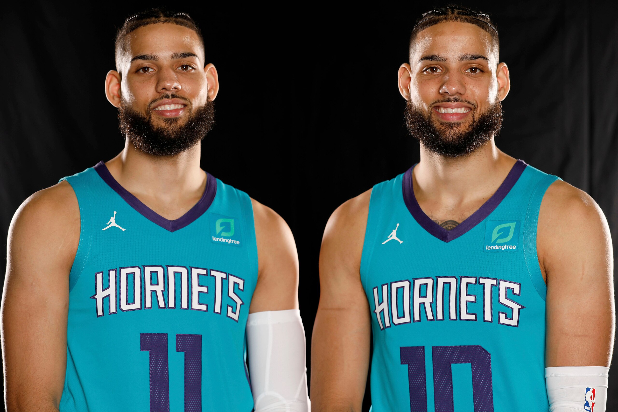 Cody (left) and Caleb Martin (right) suit up for the Charlotte Hornets at 2019 Media Day. Cody (left) and Caleb Martin (right) suit up for the Charlotte Hornets at 2019 Media Day.
