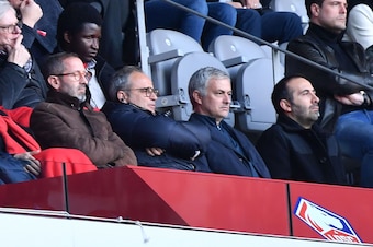 Lille's general manager Marc Ingla (front L) and Lille's Portuguese sports director Luis Campos (front 2L) sits next to former Manchester United manager Jose Mourinho (front 2R) as they watch the French L1 football match Lille (LOSC) vs Montpellier (MHSC)