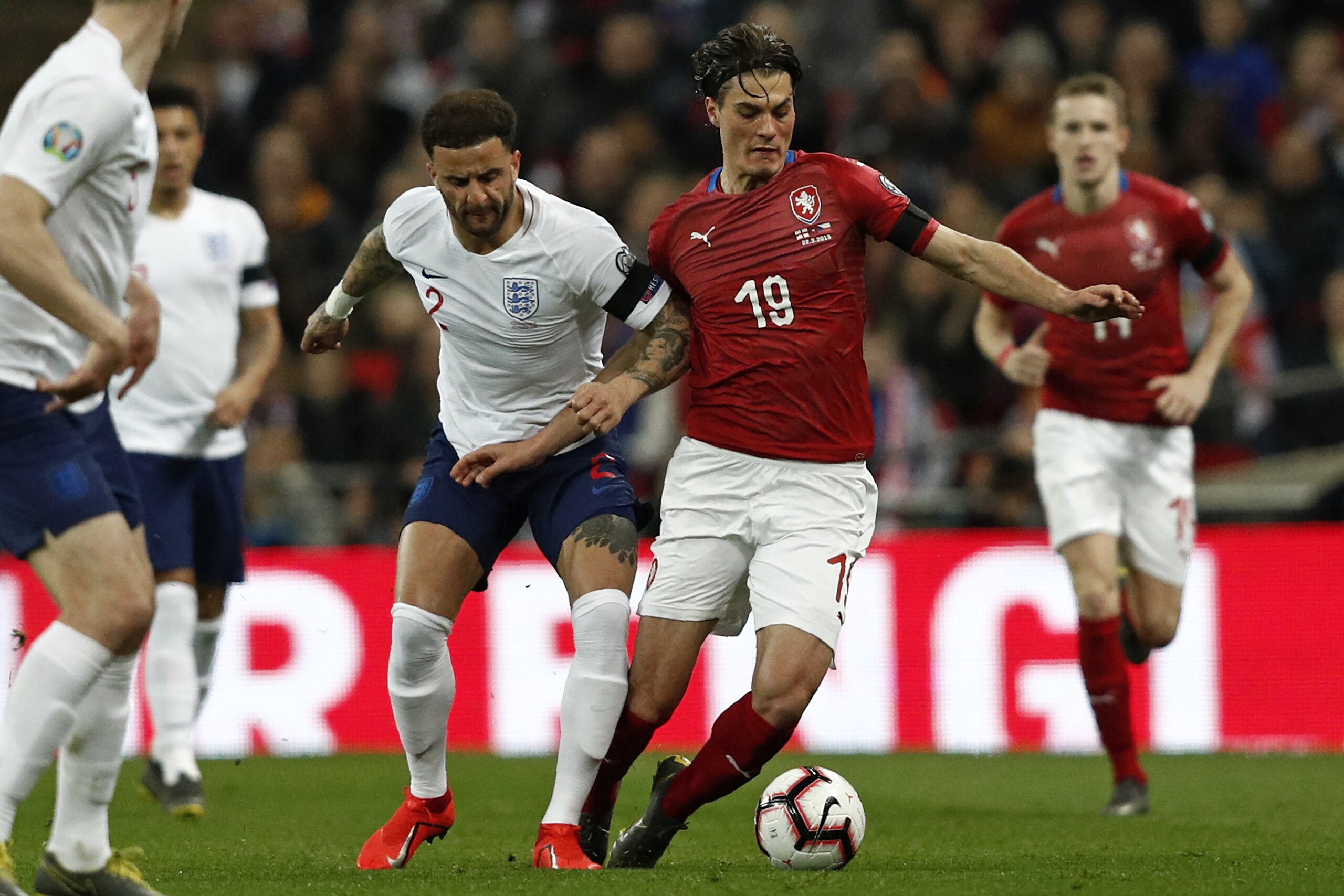 England's defender Kyle Walker (L) vies with Czech Republic's striker Patrik Schick during the UEFA Euro 2020 Group A qualification football match between England and Czech Replublic at Wembley Stadium in London on March 22, 2019. (Photo by Adrian DENNIS 