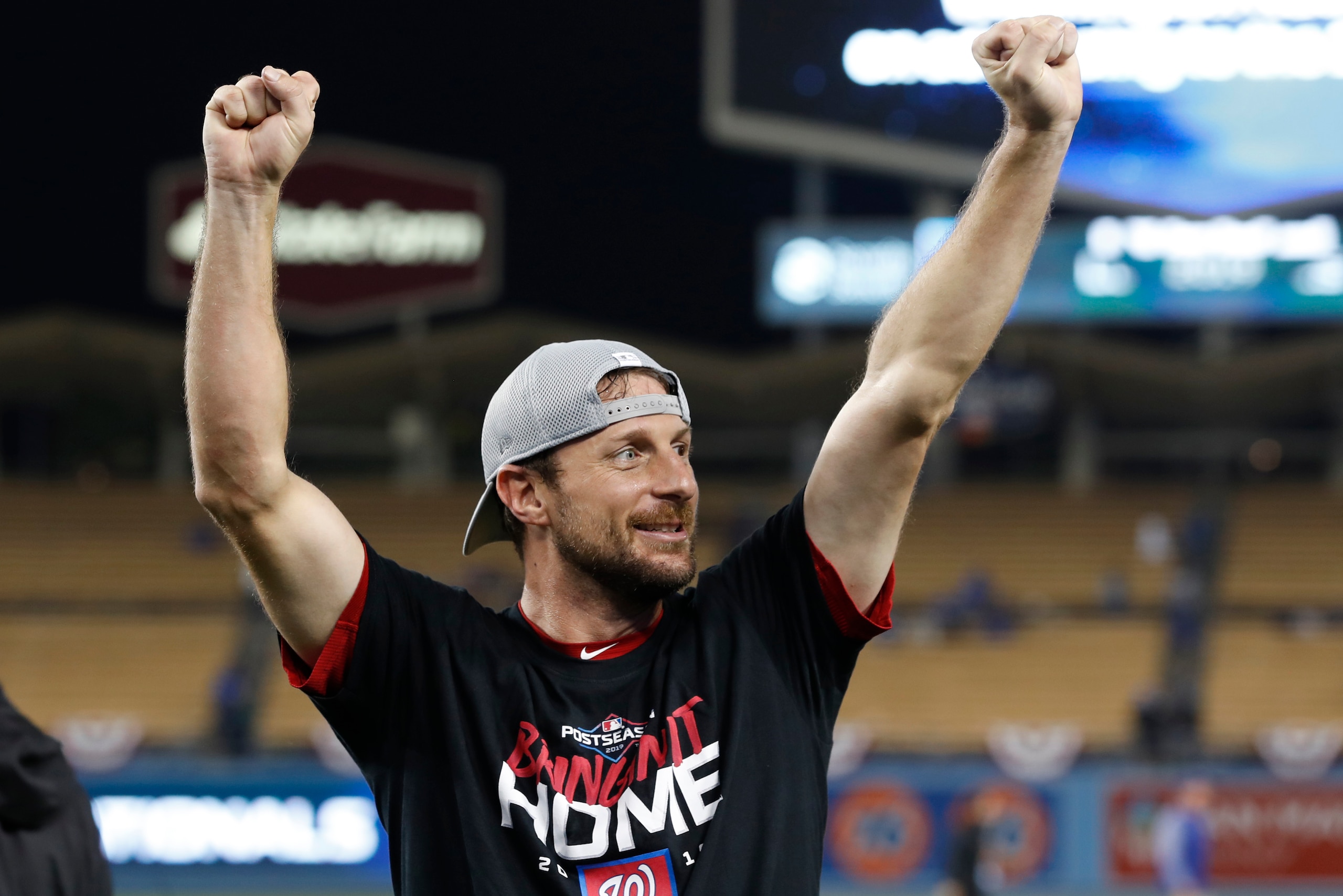 LOS ANGELES, CALIFORNIA - OCTOBER 09: Max Scherzer #31 of the Washington Nationals celebrates defeating the Los Angeles Dodgers 7-3 in ten innings to win game five and the National League Division Series at Dodger Stadium on October 09, 2019 in Los Angele LOS ANGELES, CALIFORNIA - OCTOBER 09: Max Scherzer #31 of the Washington Nationals celebrates defeating the Los Angeles Dodgers 7-3 in ten innings to win game five and the National League Division Series at Dodger Stadium on October 09, 2019 in Los Angele