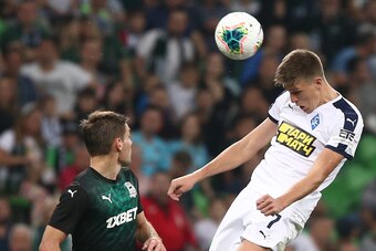 KRASNODAR, RUSSIA - SEPTEMBER 15: Ruslan Kambolov (L) of FC Krasnodar vies for the ball with Aleksandr Sobolev of FC Krylia Sovetov Samara during the Russian Premier League match between FC Krasnodar v FC Krylia Sovetov Samara at Krasnodar Stadium on Sept