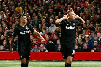 LIVERPOOL, ENGLAND - OCTOBER 02: Erling Haland of Red Bull Salzburg celebrates after scoring a goal to make it 3-3 during the UEFA Champions League group E match between Liverpool FC and RB Salzburg at Anfield on October 2, 2019 in Liverpool, United Kingd