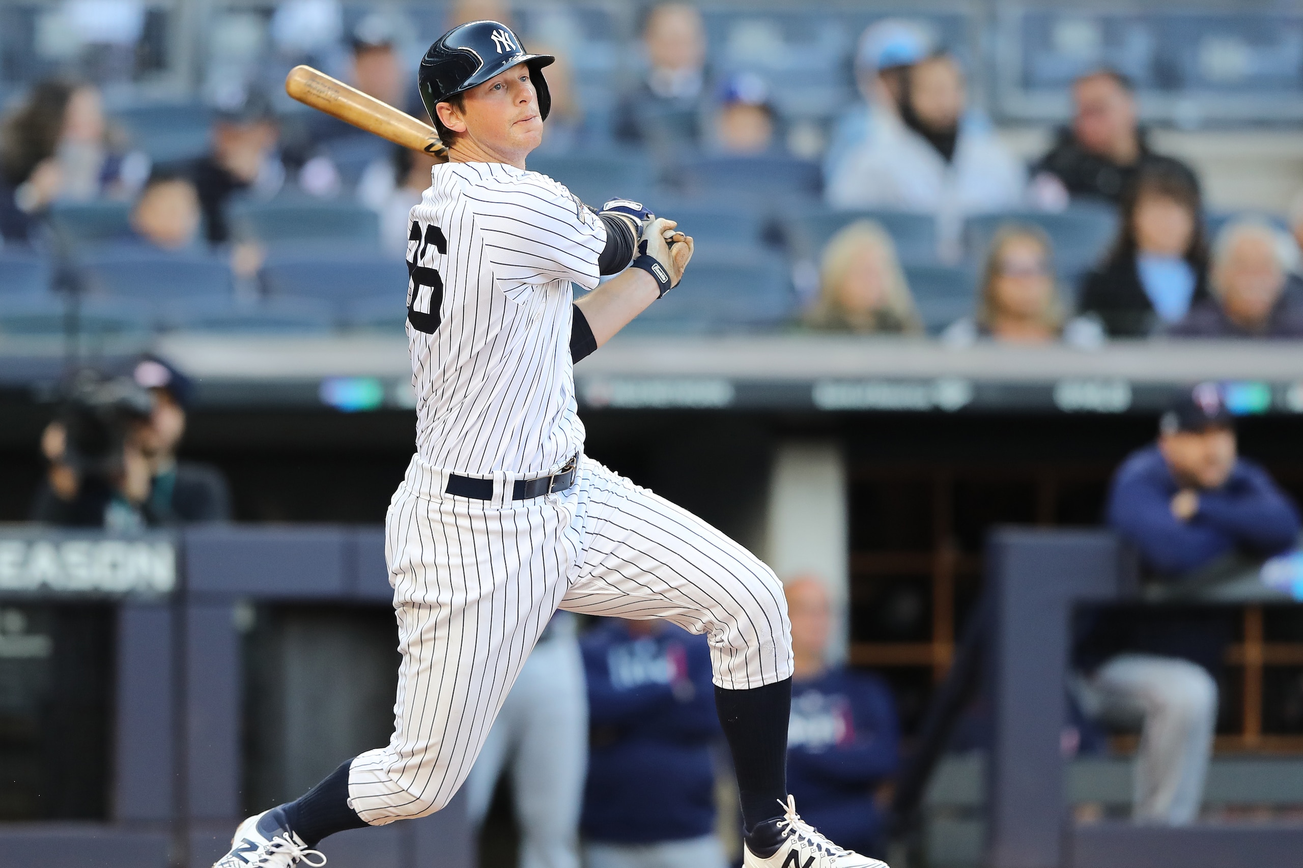 NEW YORK, NEW YORK - OCTOBER 05: DJ LeMahieu #26 of the New York Yankees hits a double off Randy Dobnak #68 of the Minnesota Twins in the first inning in game two of the American League Division Series at Yankee Stadium on October 05, 2019 in New York Cit