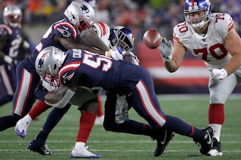 Patriots linebacker Jamie Collins knocked the ball out of Giants running back Jon Hilliman's hands late to all but secure the Patriots' 35-14 win Thursday night.