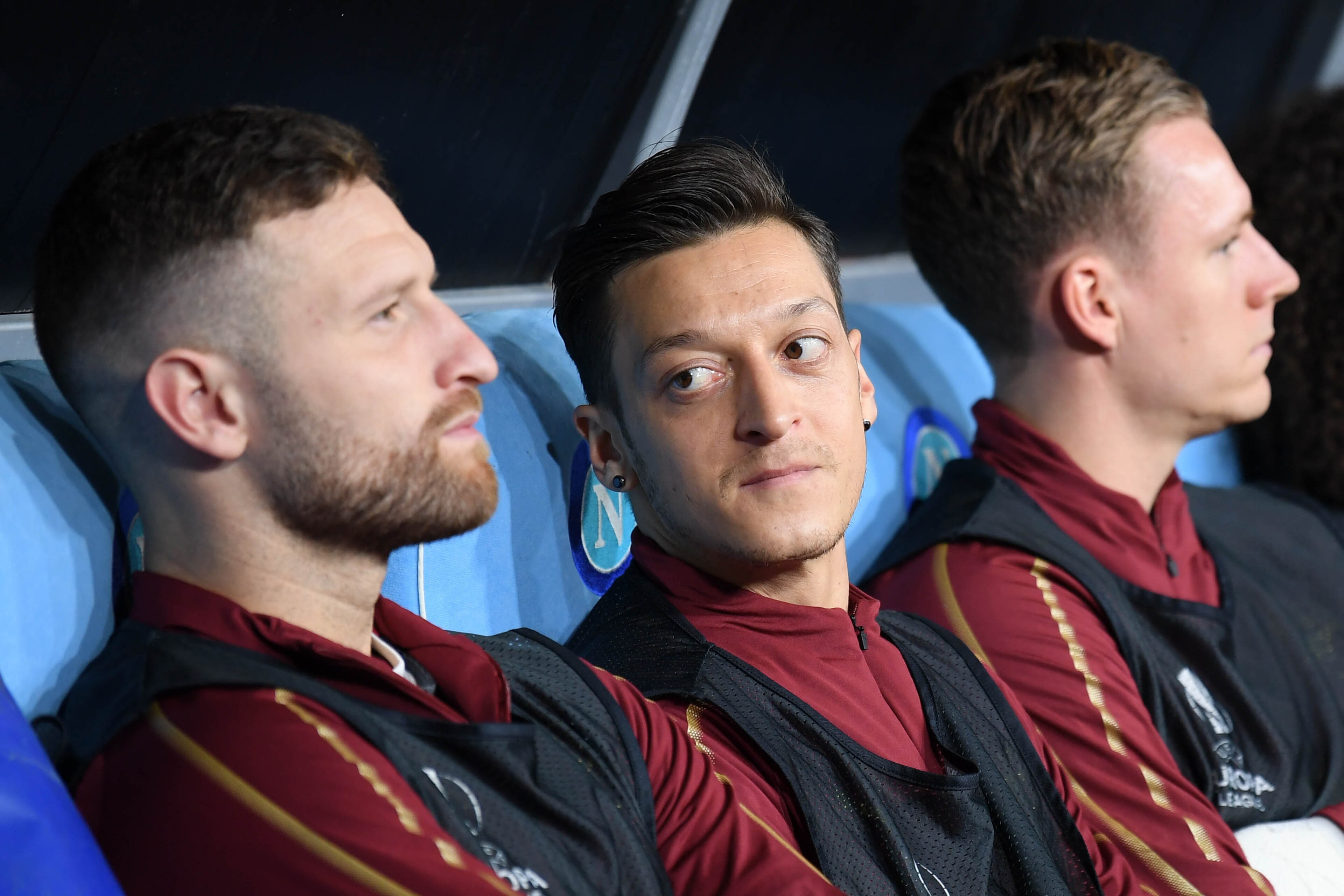 NAPLES, ITALY - APRIL 18: Mesut Ozil of Arsenal sits on the bench during the UEFA Europa League Quarter Final Second Leg match between S.S.C. Napoli and Arsenal at Stadio San Paolo on April 18, 2019 in Naples, Italy. (Photo by Stuart Franklin/Getty Images NAPLES, ITALY - APRIL 18: Mesut Ozil of Arsenal sits on the bench during the UEFA Europa League Quarter Final Second Leg match between S.S.C. Napoli and Arsenal at Stadio San Paolo on April 18, 2019 in Naples, Italy. (Photo by Stuart Franklin/Getty Images