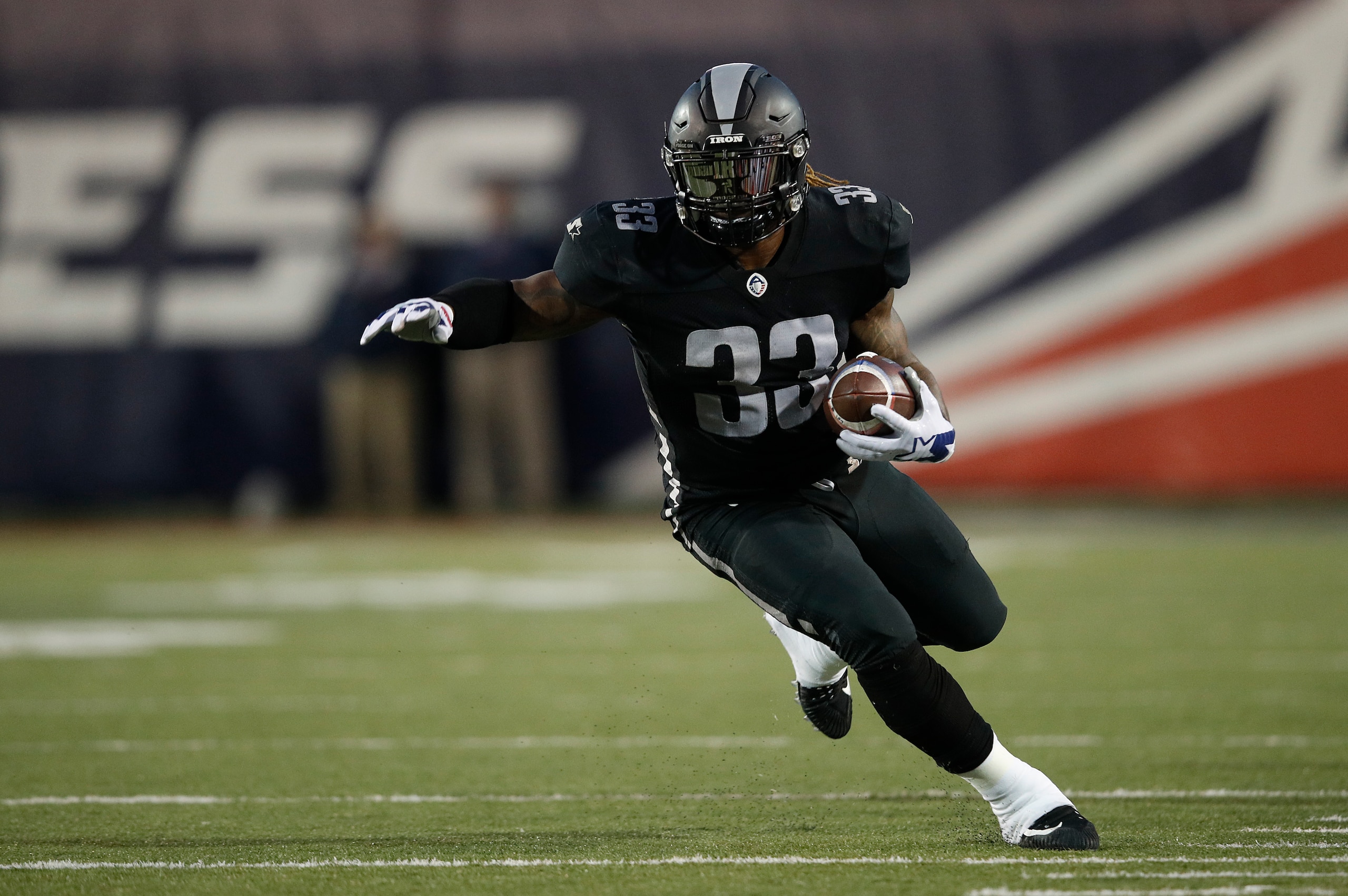 MEMPHIS, TENNESSEE - MARCH 24: Trent Richardson #33 of the Birmingham Iron runs the ball against the Memphis Express during the first quarter of their Alliance of American Football game at Liberty Bowl Memorial Stadium on March 24, 2019 in Memphis, Tennes