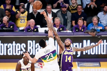 LOS ANGELES, CA - FEBRUARY 27: The opening tip-off between Anthony Davis #23 of the New Orleans Pelicans and Brandon Ingram #14 of the Los Angeles Lakers on February 27, 2019 at STAPLES Center in Los Angeles, California. NOTE TO USER: User expressly ackno