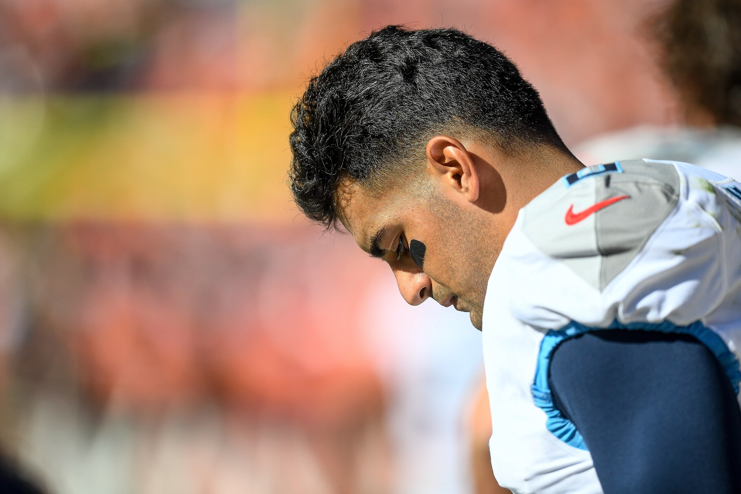 DENVER, CO - OCTOBER 13:  Marcus Mariota #8 of the Tennessee Titans stands in the bench area during a game against the Denver Broncos at Empower Field at Mile High on October 13, 2019 in Denver, Colorado. (Photo by Dustin Bradford/Getty Images)
