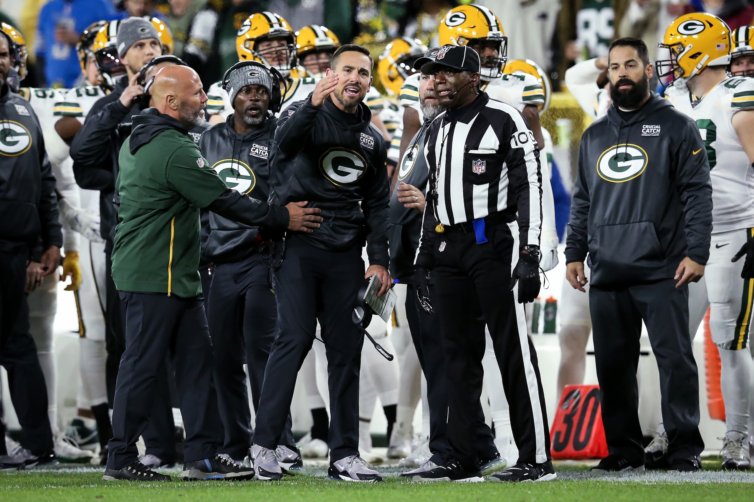 GREEN BAY, WISCONSIN - OCTOBER 14:  Head coach Matt LaFleur of the Green Bay Packers argues with referee Tom Symonette in the first quarter against the Detroit Lions at Lambeau Field on October 14, 2019 in Green Bay, Wisconsin. (Photo by Dylan Buell/Getty