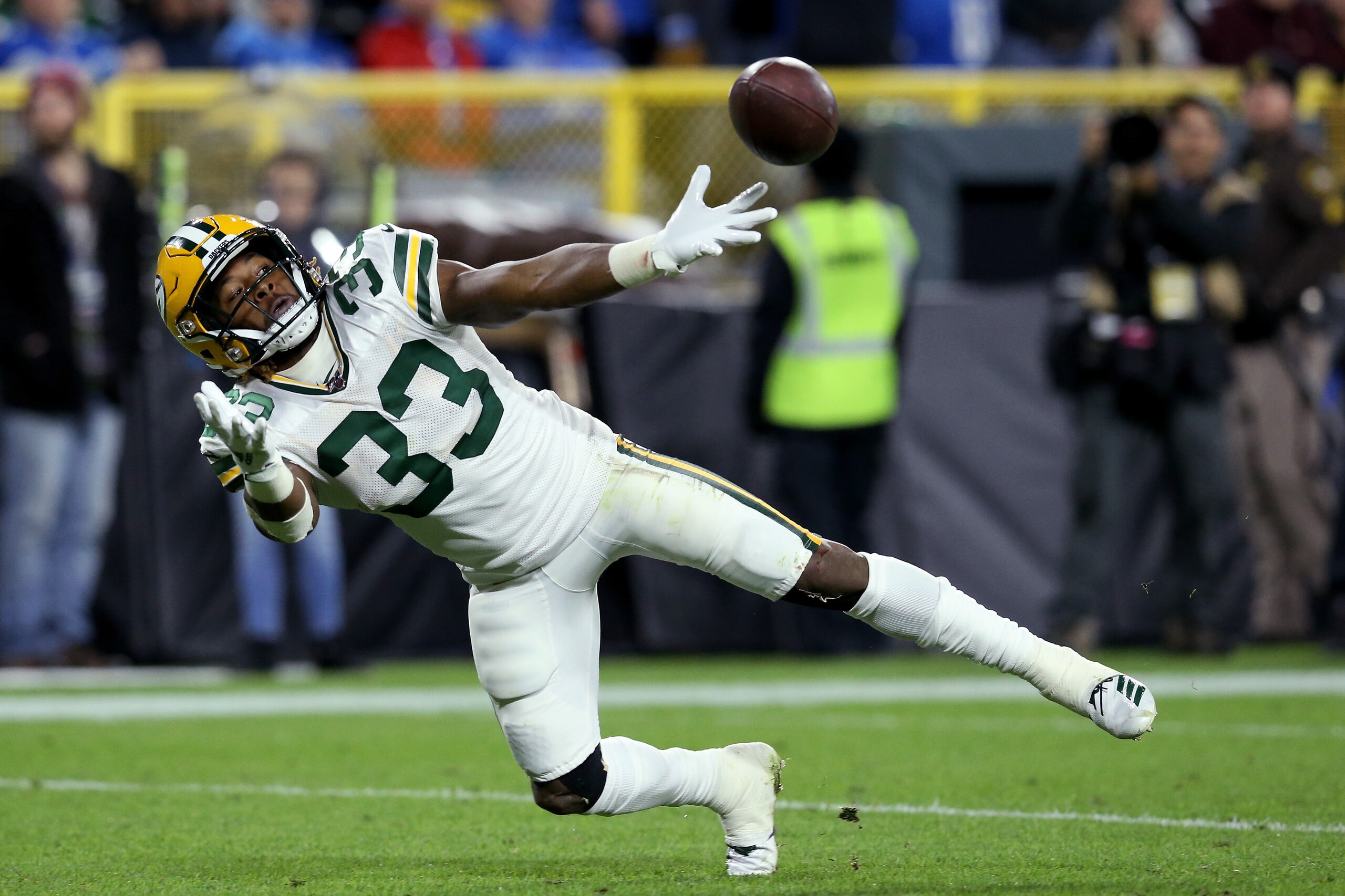 GREEN BAY, WISCONSIN - OCTOBER 14:  Aaron Jones #33 of the Green Bay Packers fails to make a catch in the second quarter against the Detroit Lions at Lambeau Field on October 14, 2019 in Green Bay, Wisconsin. (Photo by Dylan Buell/Getty Images)