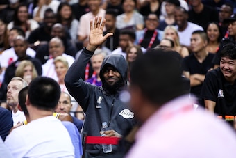 SHENZHEN, CHINA - OCTOBER 12: LeBron James #23 of the Los Angeles Lakers reacts to supporters during a preseason game against the Brooklyn Nets as part of 2019 NBA Global Games China at Shenzhen Universiade Center on October 12, 2019 in Shenzhen, Guangdon