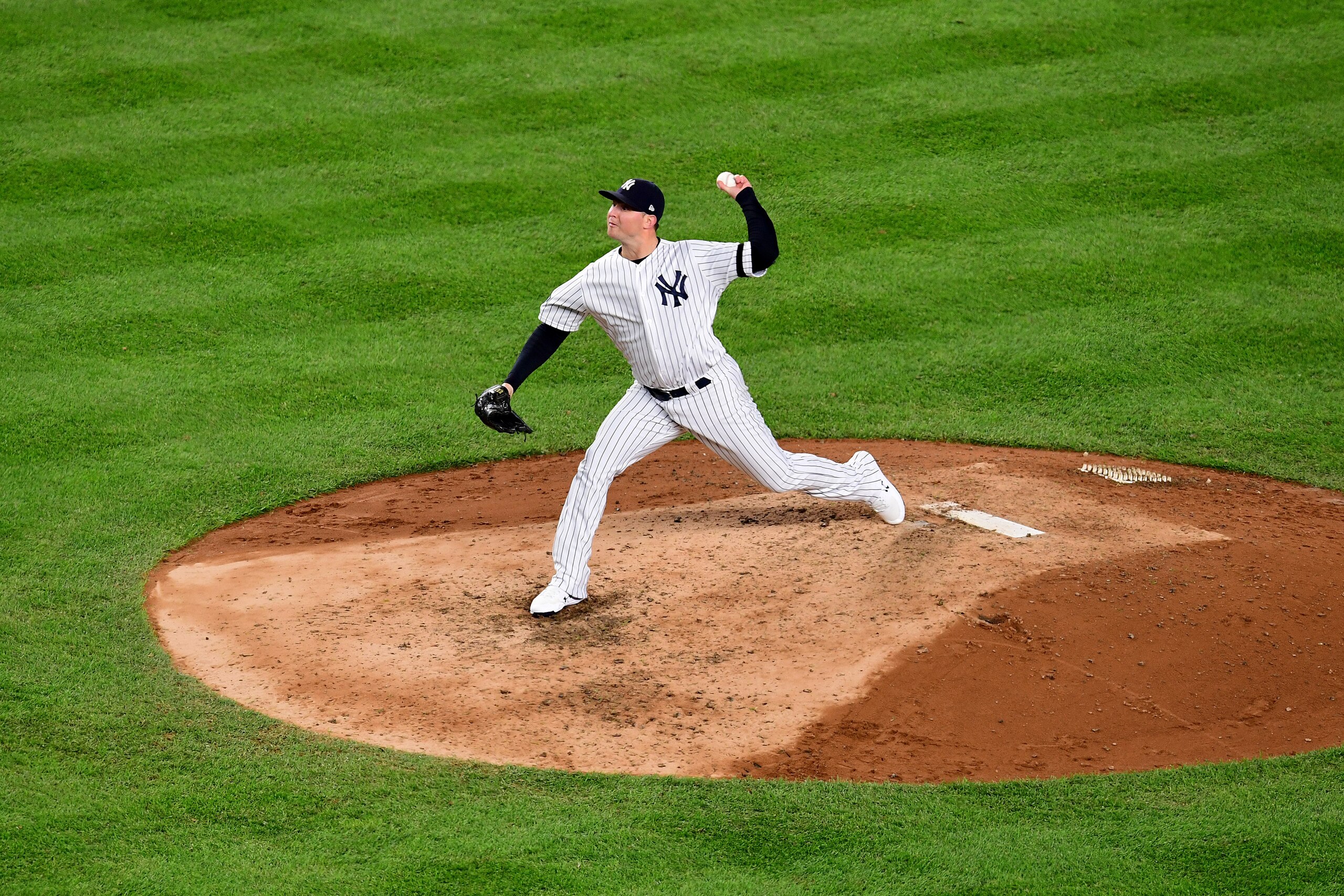 NEW YORK, NEW YORK - OCTOBER 18: Zack Britton #53 of the New York Yankees throws a pitch against the Houston Astros during the eighth inning in game five of the American League Championship Series at Yankee Stadium on October 18, 2019 in New York City. (P