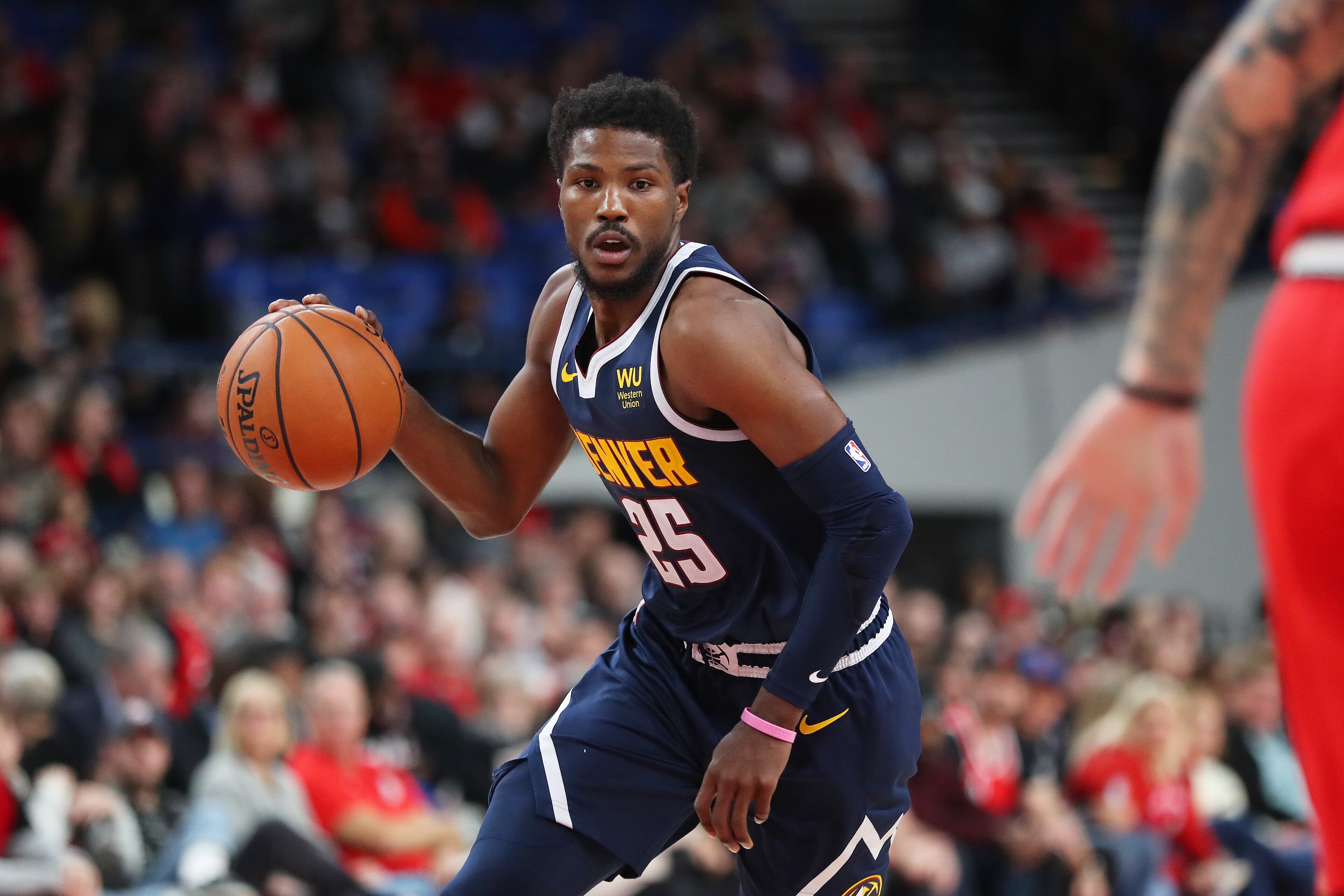 PORTLAND, OREGON - OCTOBER 08: Malik Beasley #25 of the Denver Nuggets dribbles with the ball in the fourth quarter against the Portland Trail Blazers during a preseason game at Veterans Memorial Coliseum on October 08, 2019 in Portland, Oregon. NOTE TO U PORTLAND, OREGON - OCTOBER 08: Malik Beasley #25 of the Denver Nuggets dribbles with the ball in the fourth quarter against the Portland Trail Blazers during a preseason game at Veterans Memorial Coliseum on October 08, 2019 in Portland, Oregon. NOTE TO U