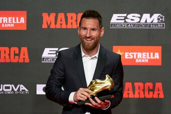 BARCELONA, SPAIN - OCTOBER 16: Lionel Messi of FC Barcelona poses with his sixth European Golden Boot awards after receiving the 2018-19 Season European Golden Shoe award for Europe's top scorer for the sixth time during the Golden Shoe Award Ceremony at 