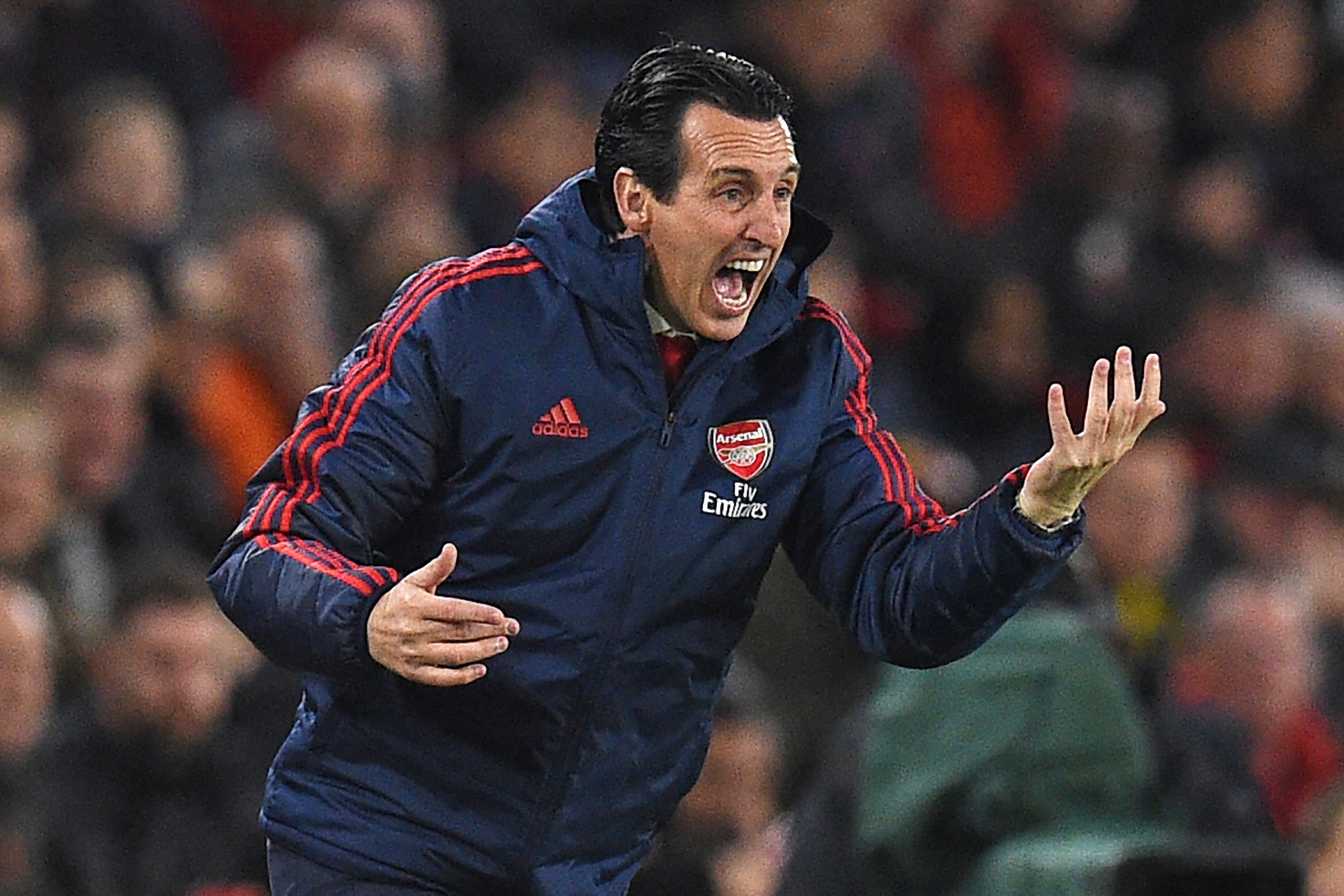 Arsenal's Spanish head coach Unai Emery gestures on the touchline during the English Premier League football match between Sheffield United and Arsenal at Bramall Lane in Sheffield, northern England on October 21, 2019. (Photo by Oli SCARFF / AFP) / RESTR