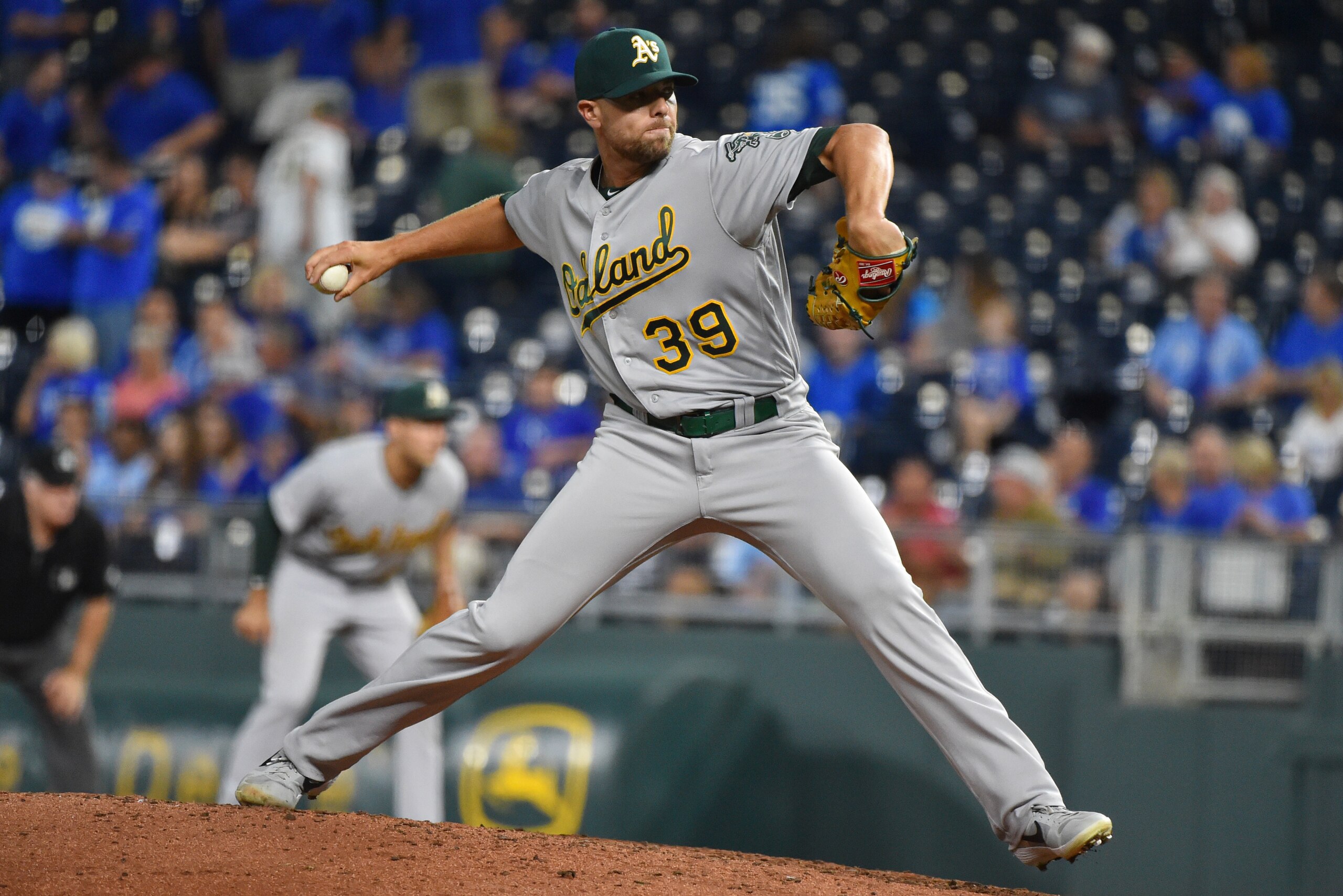KANSAS CITY, MISSOURI - AUGUST 28: Relief pitcher Blake Treinen #39 of the Oakland Athletics throws in the eighth inning against the Kansas City Royals at Kauffman Stadium on August 28, 2019 in Kansas City, Missouri. (Photo by Ed Zurga/Getty Images)