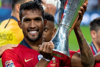 PORTO, PORTUGAL - JUNE 09: Dyego Sousa of Portugal celebrates with UEFA Nations League Cup after winning the UEFA Nations League Final between Portugal and the Netherlands at Estadio do Dragao on June 9, 2019 in Porto, Portugal. (Photo by TF-Images/Getty 