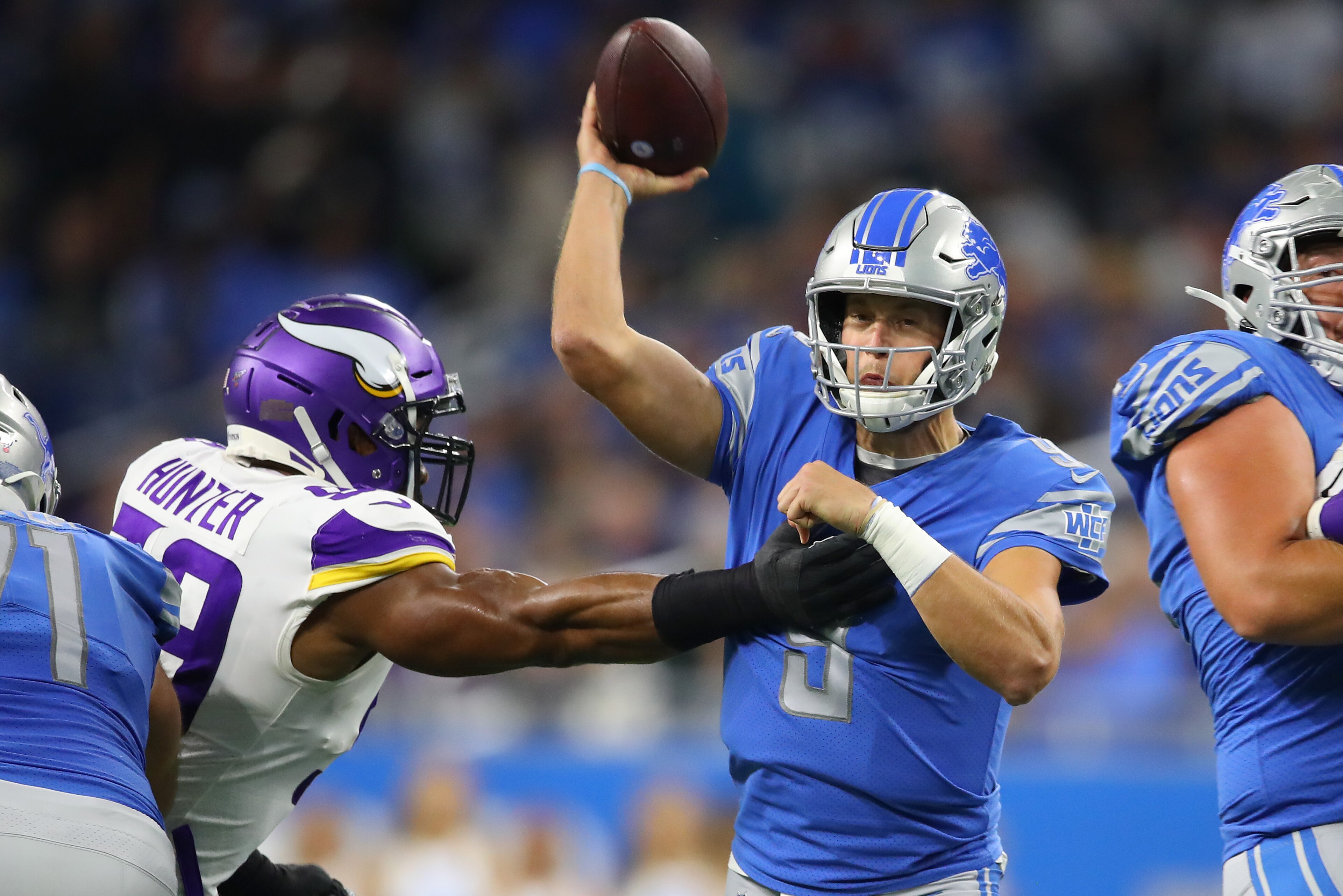 DETROIT, MICHIGAN - OCTOBER 20: Matthew Stafford #9 of the Detroit Lions tries to get a first half pass off around Danielle Hunter #99 of the Minnesota Vikings at Ford Field on October 20, 2019 in Detroit, Michigan. (Photo by Gregory Shamus/Getty Images) DETROIT, MICHIGAN - OCTOBER 20: Matthew Stafford #9 of the Detroit Lions tries to get a first half pass off around Danielle Hunter #99 of the Minnesota Vikings at Ford Field on October 20, 2019 in Detroit, Michigan. (Photo by Gregory Shamus/Getty Images)