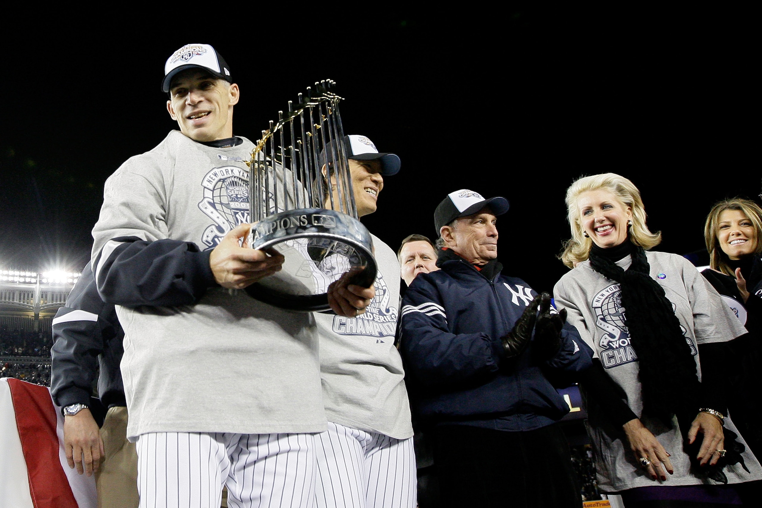 NEW YORK - NOVEMBER 04:  Manager Joe Girardi #27 of the New York Yankees celebrate after their 7-3 win against the Philadelphia Phillies in Game Six of the 2009 MLB World Series at Yankee Stadium on November 4, 2009 in the Bronx borough of New York City. 