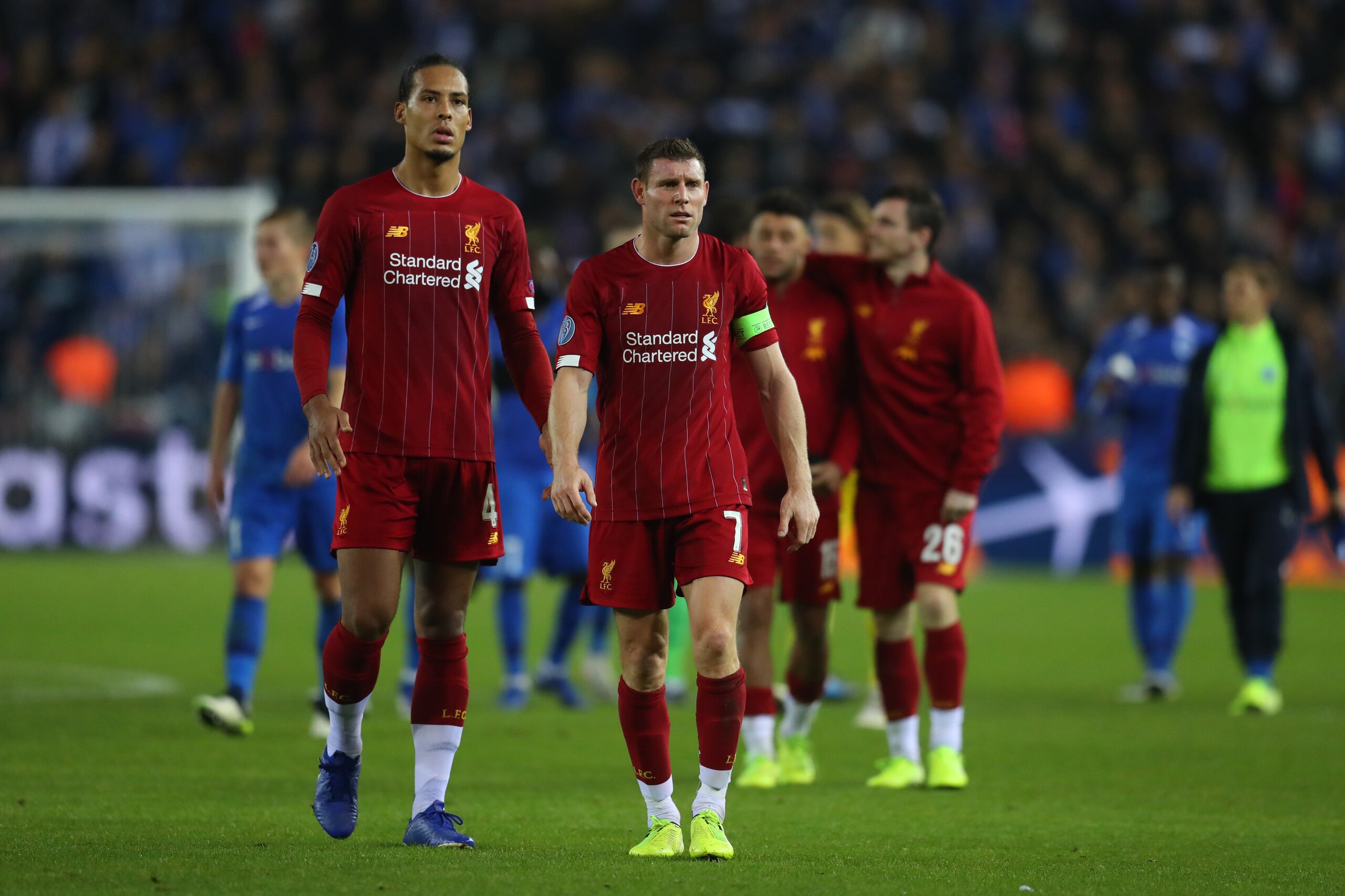 GENK, BELGIUM - OCTOBER 23: Virgil van Dijk and James Milner of Liverpool  after the UEFA Champions League group E match between KRC Genk and Liverpool FC at Luminus Arena on October 23, 2019 in Genk, Belgium. (Photo by Catherine Ivill/Getty Images)