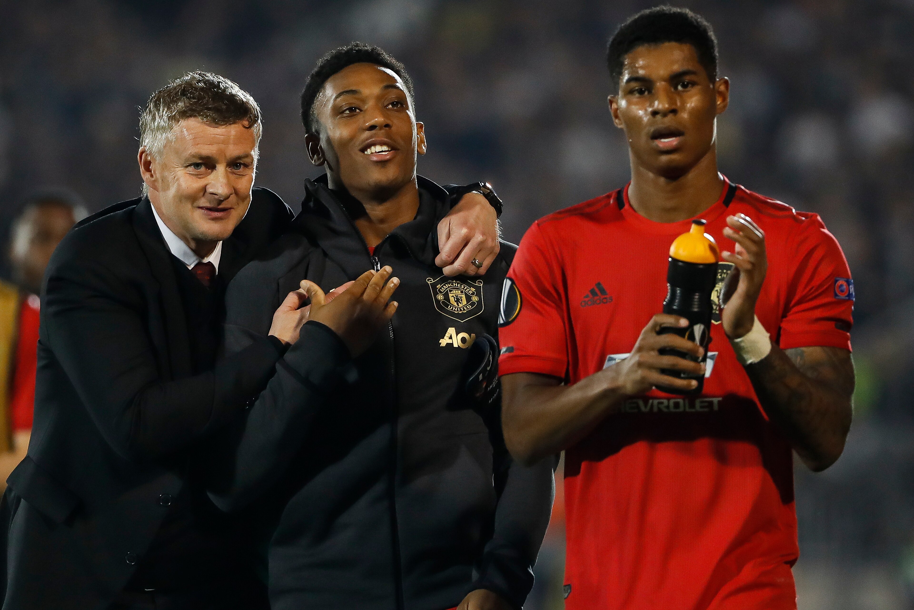 BELGRADE, SERBIA - OCTOBER 24: manager Ole Gunnar Solskjaer (L) of Manchester United celebrate with Anthony Martial (C) and Marcus Rashford (R) after the UEFA Europa League group L match between Partizan and Manchester United at Partizan Stadium on Octobe