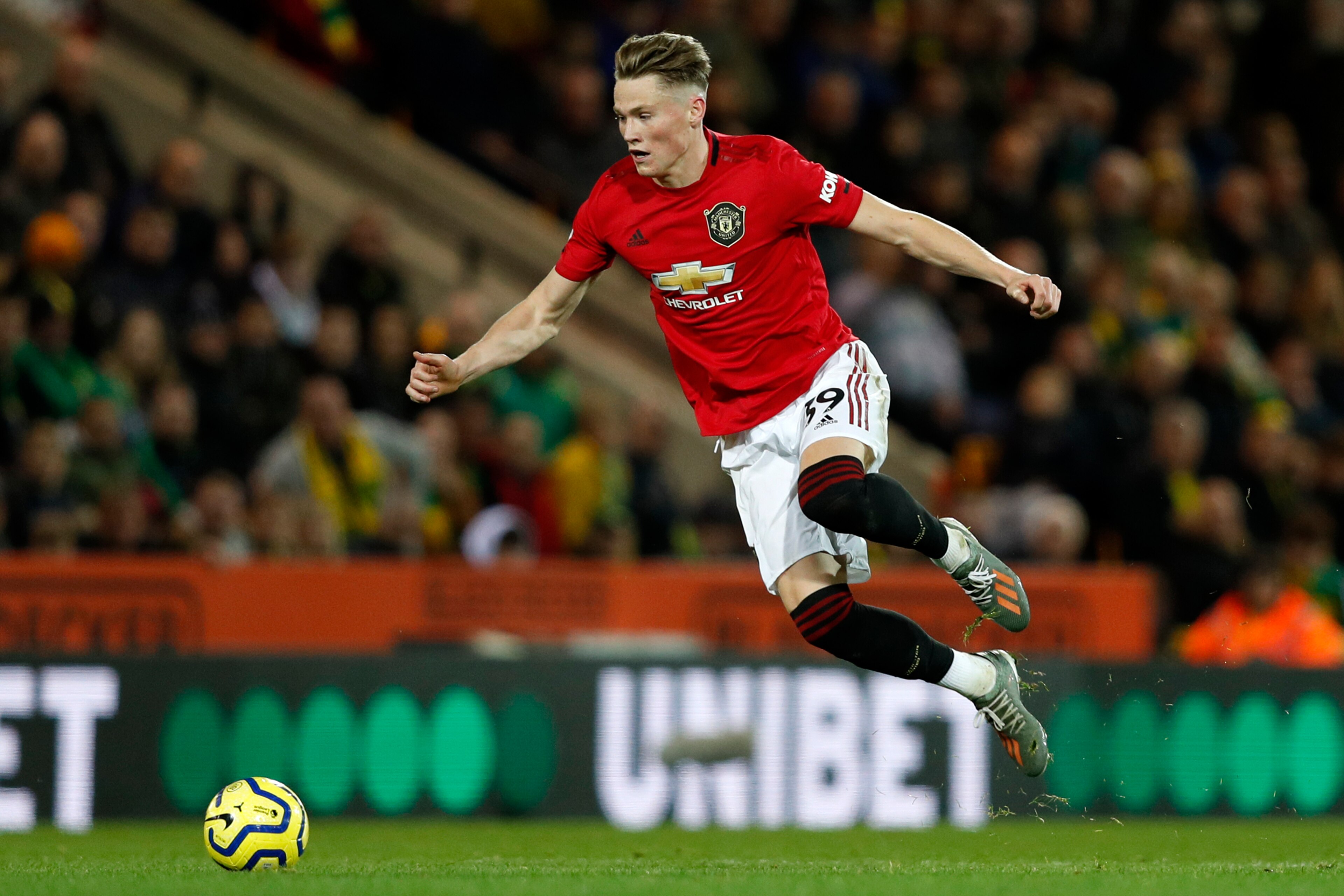 Manchester United's English midfielder Scott McTominay runs with the ball during the English Premier League football match between Norwich City and Manchester United at Carrow Road in Norwich, eastern England on October 27, 2019. - Manchester United won t Manchester United's English midfielder Scott McTominay runs with the ball during the English Premier League football match between Norwich City and Manchester United at Carrow Road in Norwich, eastern England on October 27, 2019. - Manchester United won t