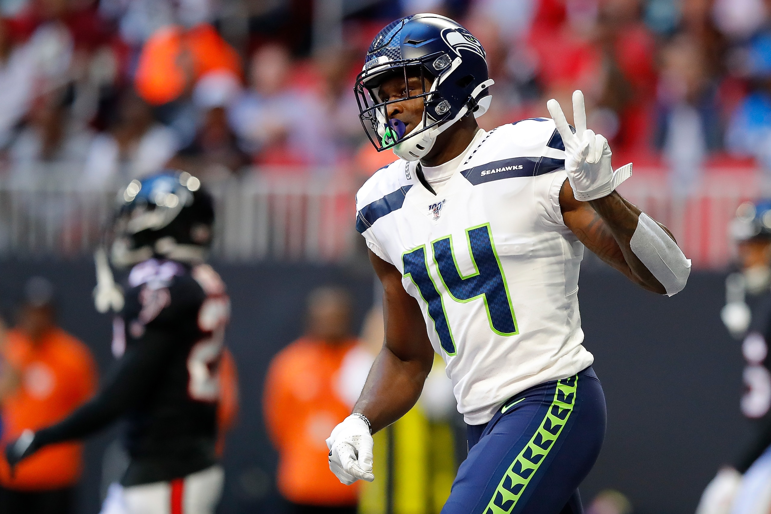 ATLANTA, GEORGIA - OCTOBER 27: DK Metcalf #14 of the Seattle Seahawks reacts after pulling in a touchdown reception against the Atlanta Falcons in the first half at Mercedes-Benz Stadium on October 27, 2019 in Atlanta, Georgia. (Photo by Kevin C. Cox/Get ATLANTA, GEORGIA - OCTOBER 27: DK Metcalf #14 of the Seattle Seahawks reacts after pulling in a touchdown reception against the Atlanta Falcons in the first half at Mercedes-Benz Stadium on October 27, 2019 in Atlanta, Georgia. (Photo by Kevin C. Cox/Get