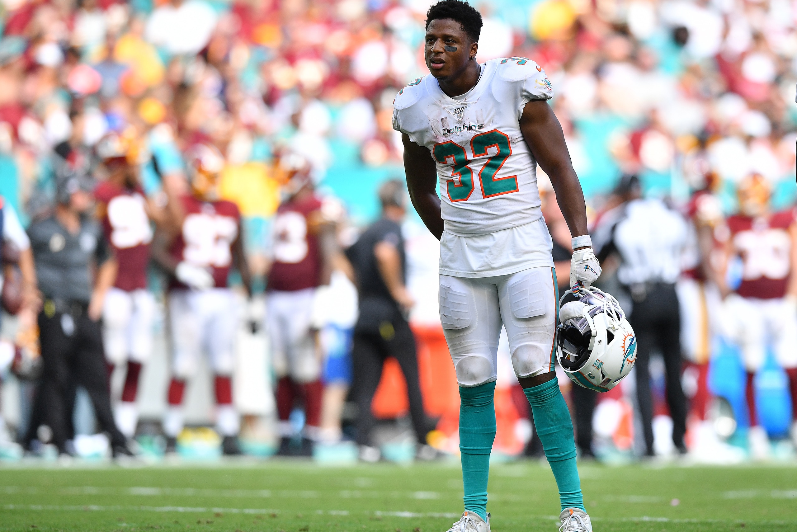 MIAMI, FLORIDA - OCTOBER 13: Kenyan Drake #32 of the Miami Dolphins looks on during a break in the game against the Washington Redskins in the fourth quarter at Hard Rock Stadium on October 13, 2019 in Miami, Florida. (Photo by Mark Brown/Getty Images) MIAMI, FLORIDA - OCTOBER 13: Kenyan Drake #32 of the Miami Dolphins looks on during a break in the game against the Washington Redskins in the fourth quarter at Hard Rock Stadium on October 13, 2019 in Miami, Florida. (Photo by Mark Brown/Getty Images)