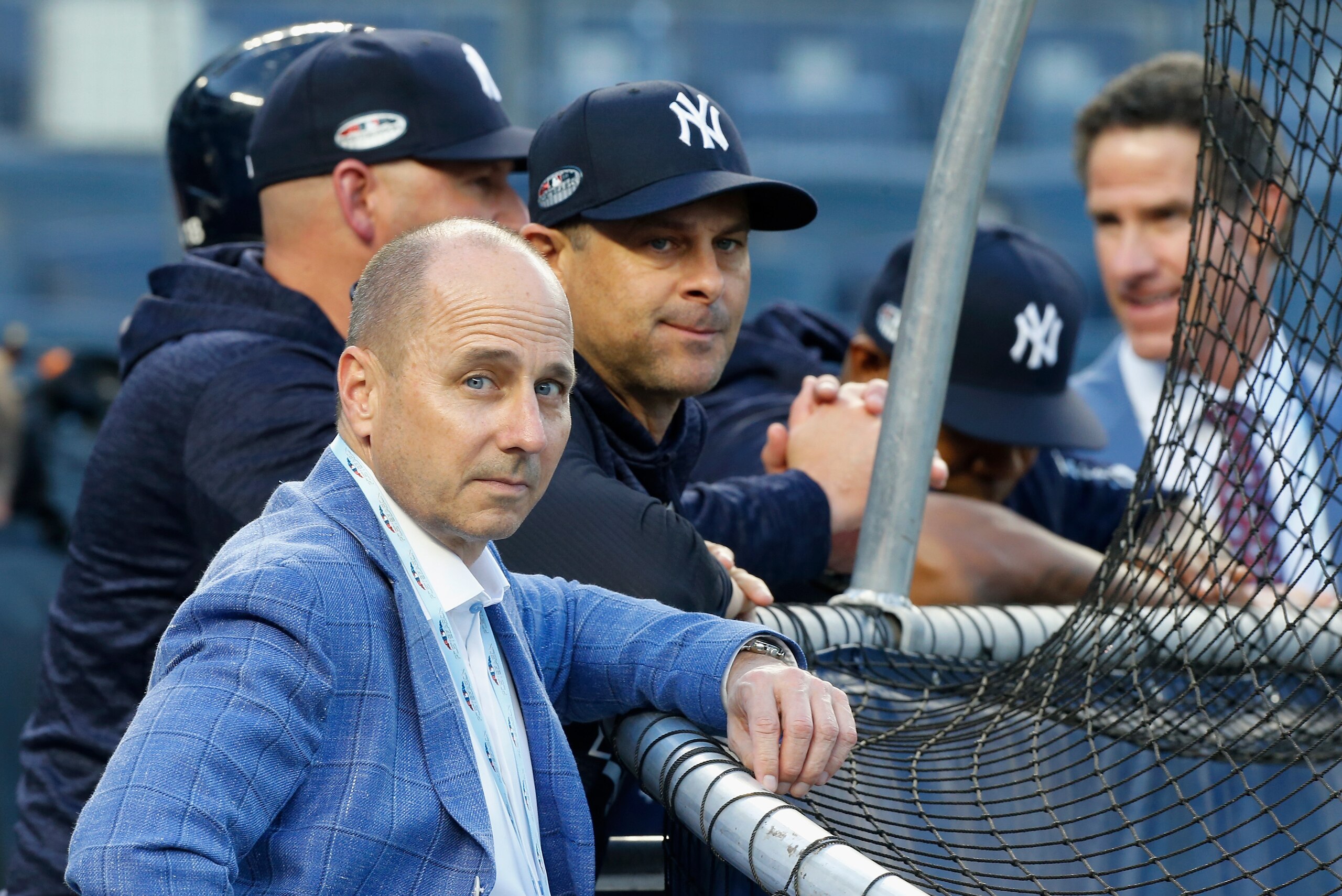 NEW YORK, NY - OCTOBER 09: (NEW YORK DAILIES OUT) General Manager Brian Cashman and Manager Aaron Boone #17 of the New York Yankees during batting practice before Game Four of the American League Division Series against the Boston Red Sox at Yankee Sta NEW YORK, NY - OCTOBER 09: (NEW YORK DAILIES OUT) General Manager Brian Cashman and Manager Aaron Boone #17 of the New York Yankees during batting practice before Game Four of the American League Division Series against the Boston Red Sox at Yankee Sta