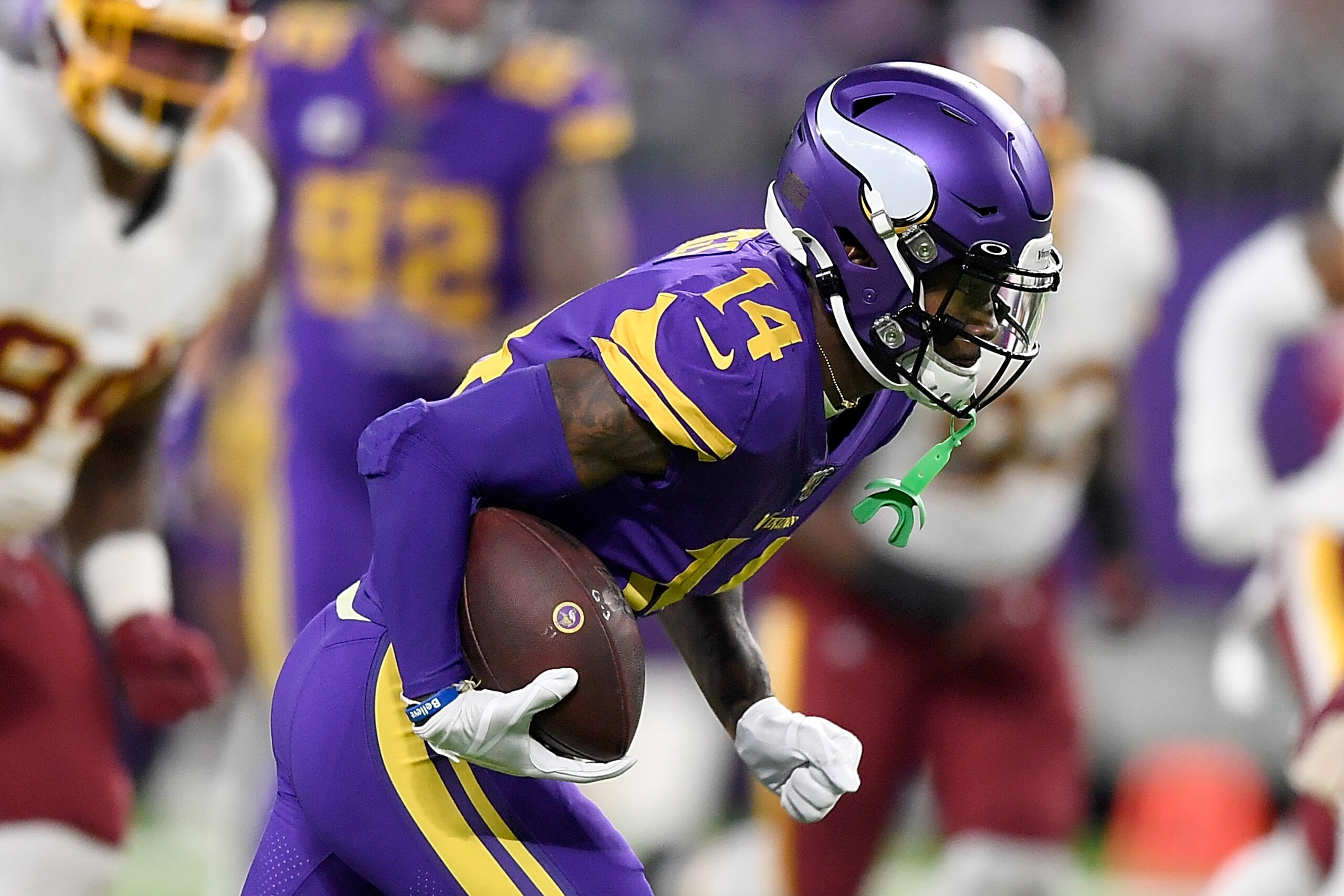MINNEAPOLIS, MINNESOTA - OCTOBER 24: Wide receiver Stefon Diggs #14 of the Minnesota Vikings runs against the defense of the Washington Redskins in the game at U.S. Bank Stadium on October 24, 2019 in Minneapolis, Minnesota. (Photo by Hannah Foslien/Getty