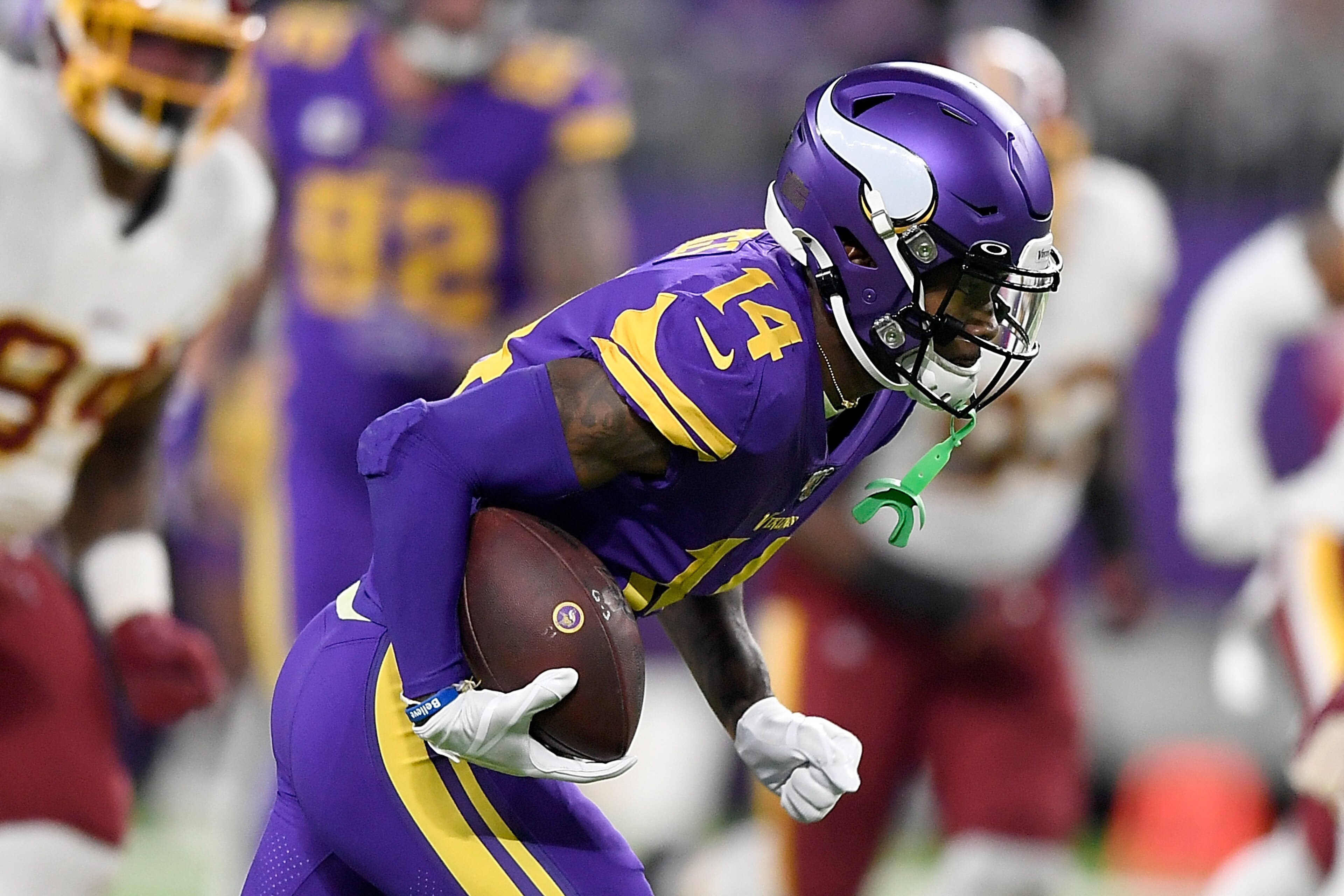 MINNEAPOLIS, MINNESOTA - OCTOBER 24: Wide receiver Stefon Diggs #14 of the Minnesota Vikings runs against the defense of the Washington Redskins in the game at U.S. Bank Stadium on October 24, 2019 in Minneapolis, Minnesota. (Photo by Hannah Foslien/Getty