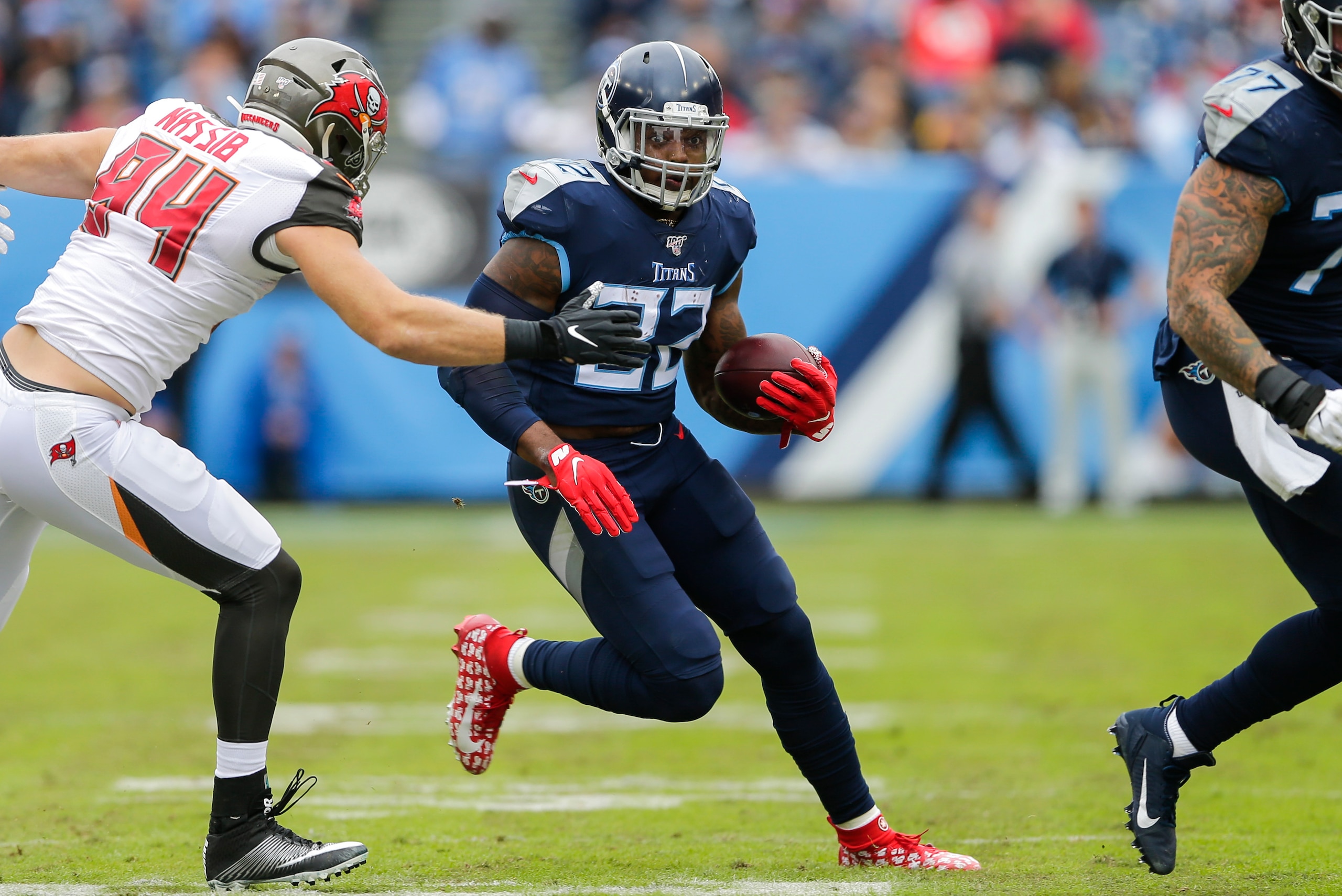 NASHVILLE, TENNESSEE - OCTOBER 27: Derrick Henry #22 of the Tennessee Titans runs with the ball against the Tampa Bay Buccaneers during the second quarter at Nissan Stadium on October 27, 2019 in Nashville, Tennessee. (Photo by Silas Walker/Getty Images)