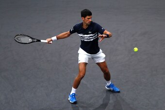 PARIS, FRANCE - OCTOBER 30:  Novak Djokovic of Serbia returns a forehand in his match against Corentin Moutet of France on day 3 of the Rolex Paris Masters, part of the ATP World Tour Masters 1000 held at the at AccorHotels Arena on October 30, 2019 in Pa
