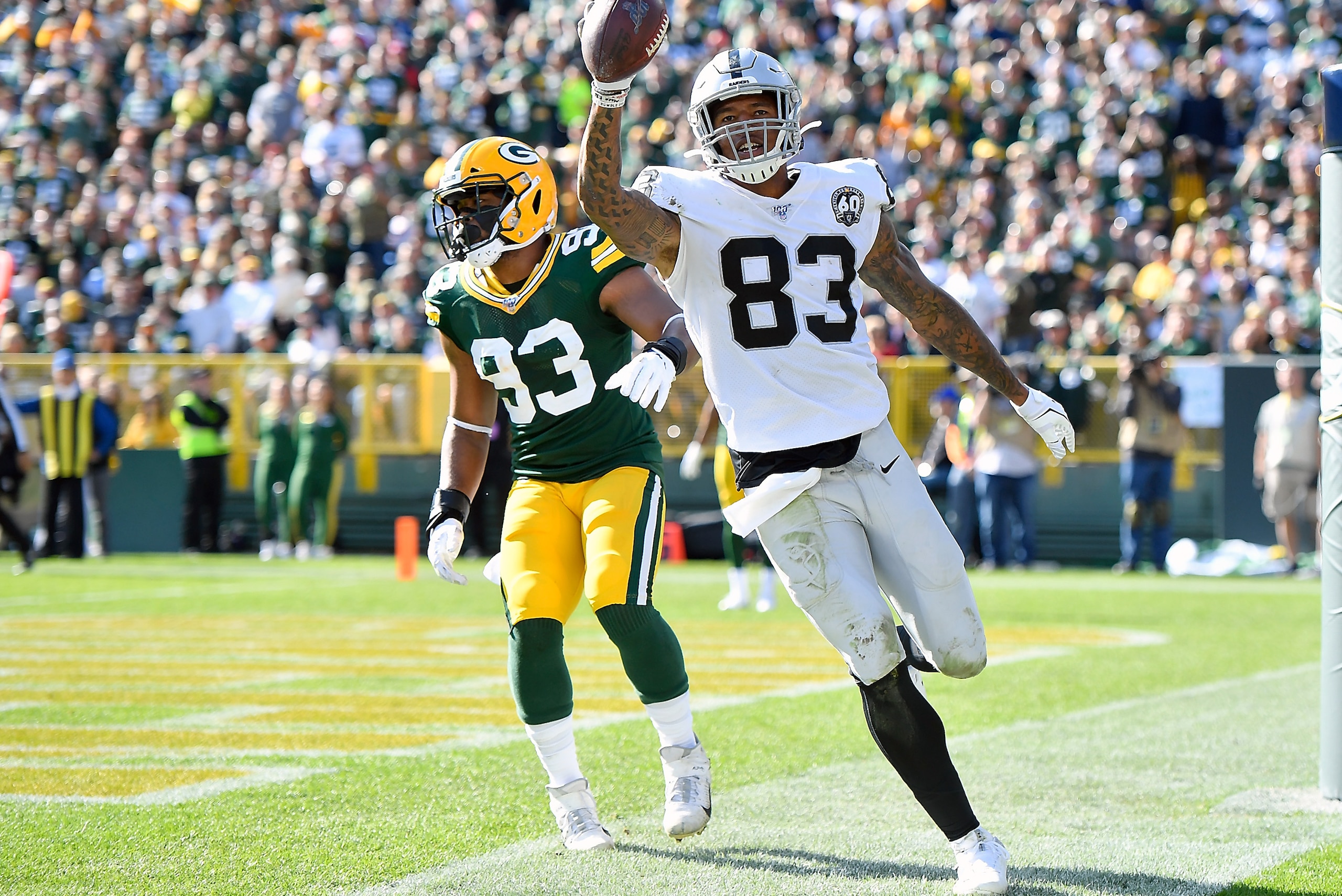GREEN BAY, WISCONSIN - OCTOBER 20: Darren Waller #83 of the Oakland Raiders scores a touchdown in the second half against the Oakland Raiders at Lambeau Field on October 20, 2019 in Green Bay, Wisconsin. (Photo by Quinn Harris/Getty Images)