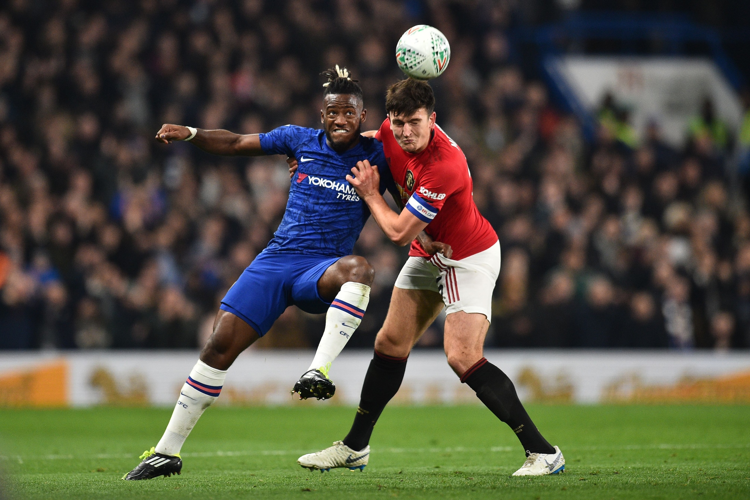 Chelsea's Belgian striker Michy Batshuayi (L) vies with Manchester United's English defender Harry Maguire during the English League Cup fourth round football match between Chelsea and Manchester United at Stamford Bridge in London on October 30, 2019. (P Chelsea's Belgian striker Michy Batshuayi (L) vies with Manchester United's English defender Harry Maguire during the English League Cup fourth round football match between Chelsea and Manchester United at Stamford Bridge in London on October 30, 2019. (P