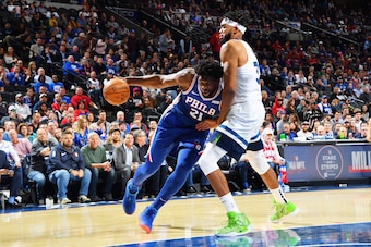 PHILADELPHIA, PA - OCTOBER 30: Joel Embiid #21 of the Philadelphia 76ers handles the ball against Karl-Anthony Towns #32 of the Minnesota Timberwolves on October 30, 2019 at the Wells Fargo Center in Philadelphia, Pennsylvania NOTE TO USER: User expressly