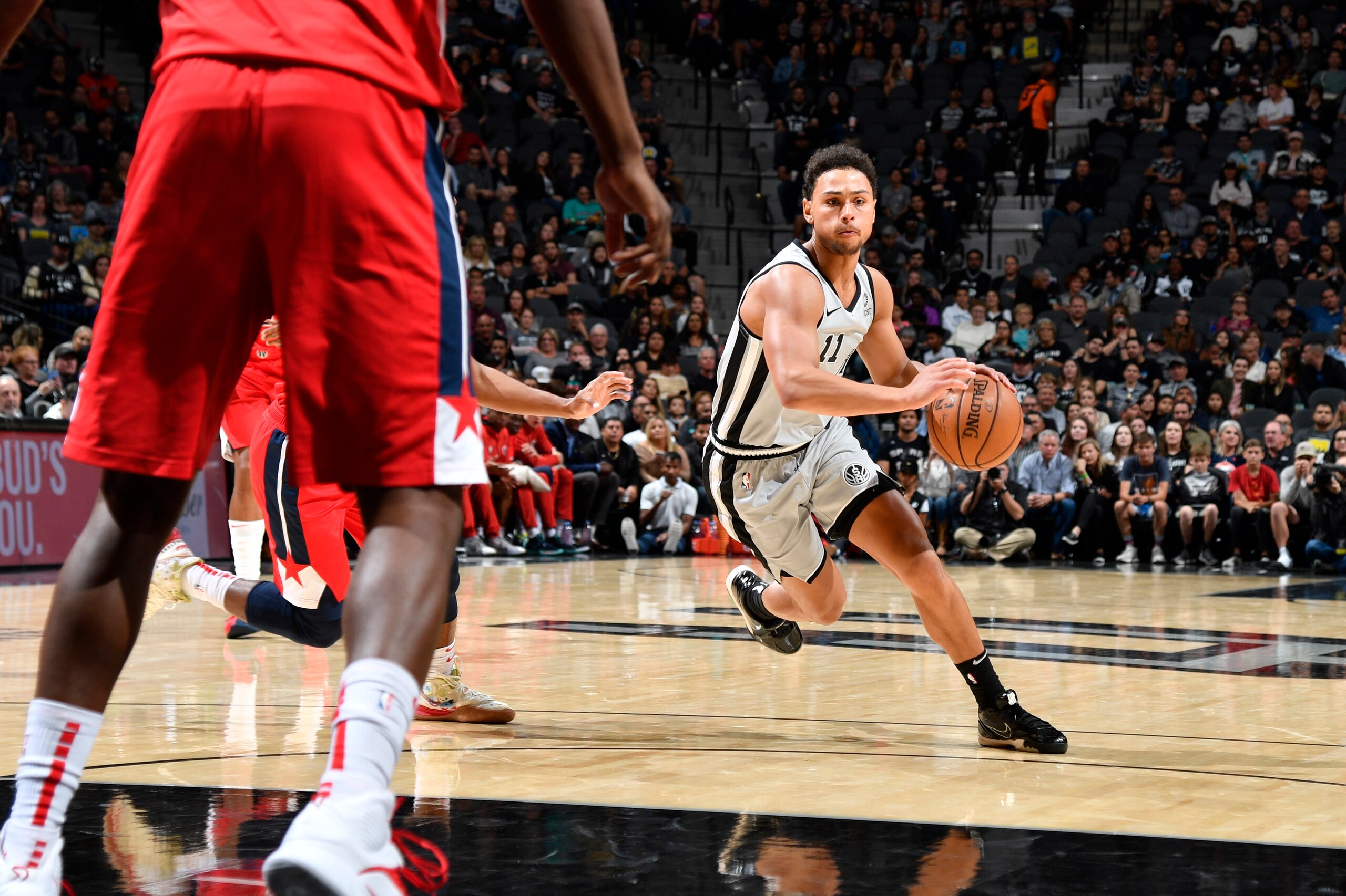 SAN ANTONIO, TX - OCTOBER 26: Bryn Forbes #11 of the San Antonio Spurs handles the ball against the Washington Wizards on October 26, 2019 at the AT&T Center in San Antonio, Texas. NOTE TO USER: User expressly acknowledges and agrees that, by downloading 