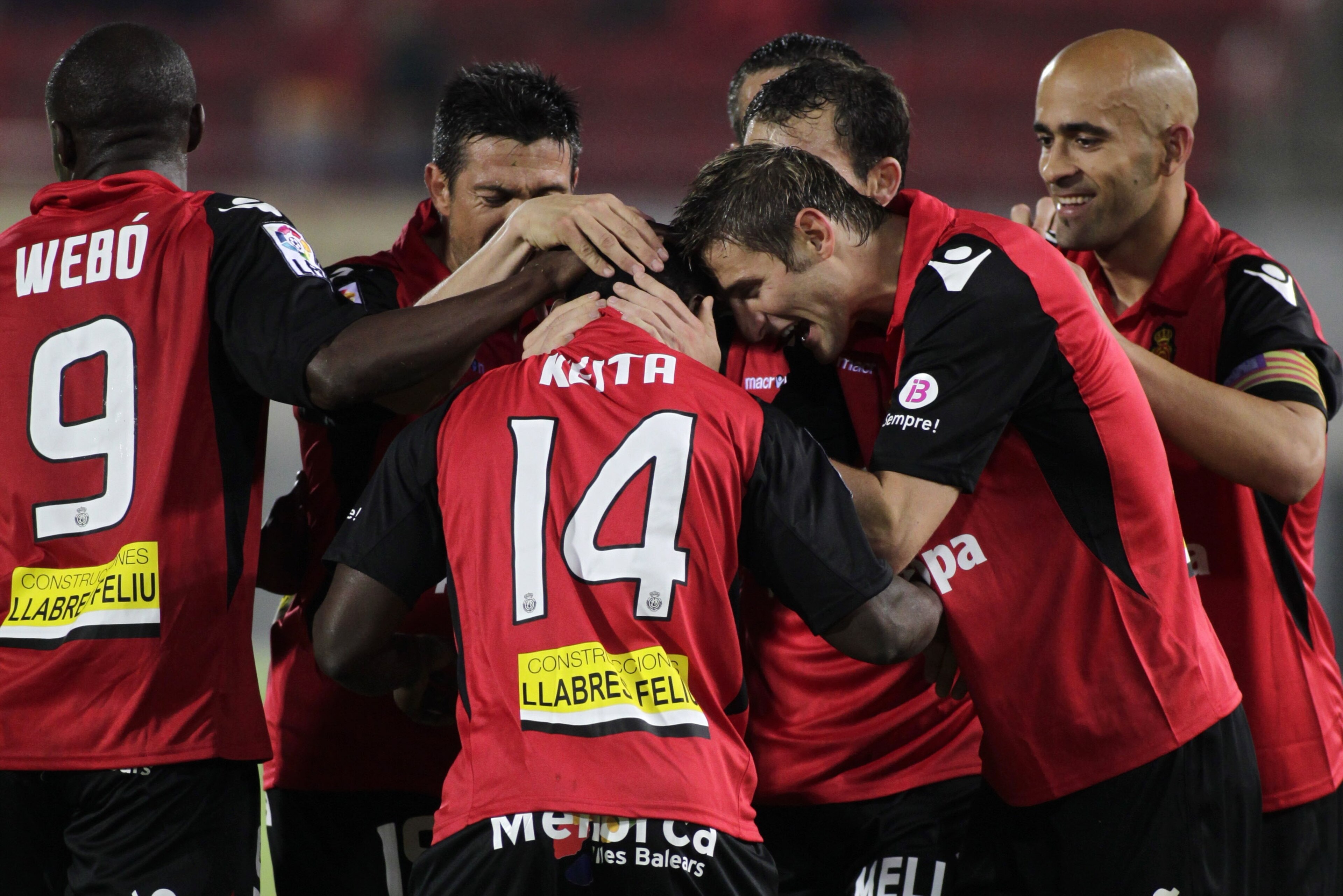Mallorca's players celebrate after scoring against Osasuna during their Spanish League football match at the Ono Stadium in Palma de Mallorca, on April 19, 2010. AFP PHOTO/Jaime REINA (Photo credit should read JAIME REINA/AFP via Getty Images) Mallorca's players celebrate after scoring against Osasuna during their Spanish League football match at the Ono Stadium in Palma de Mallorca, on April 19, 2010. AFP PHOTO/Jaime REINA (Photo credit should read JAIME REINA/AFP via Getty Images)